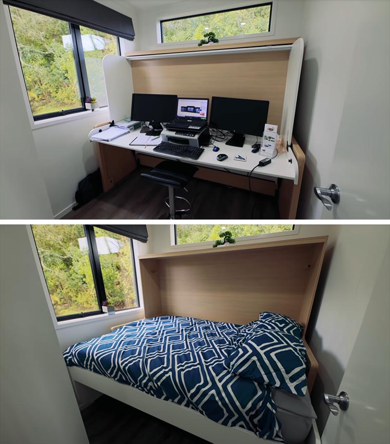 A home office with a desk that transforms into a bed.