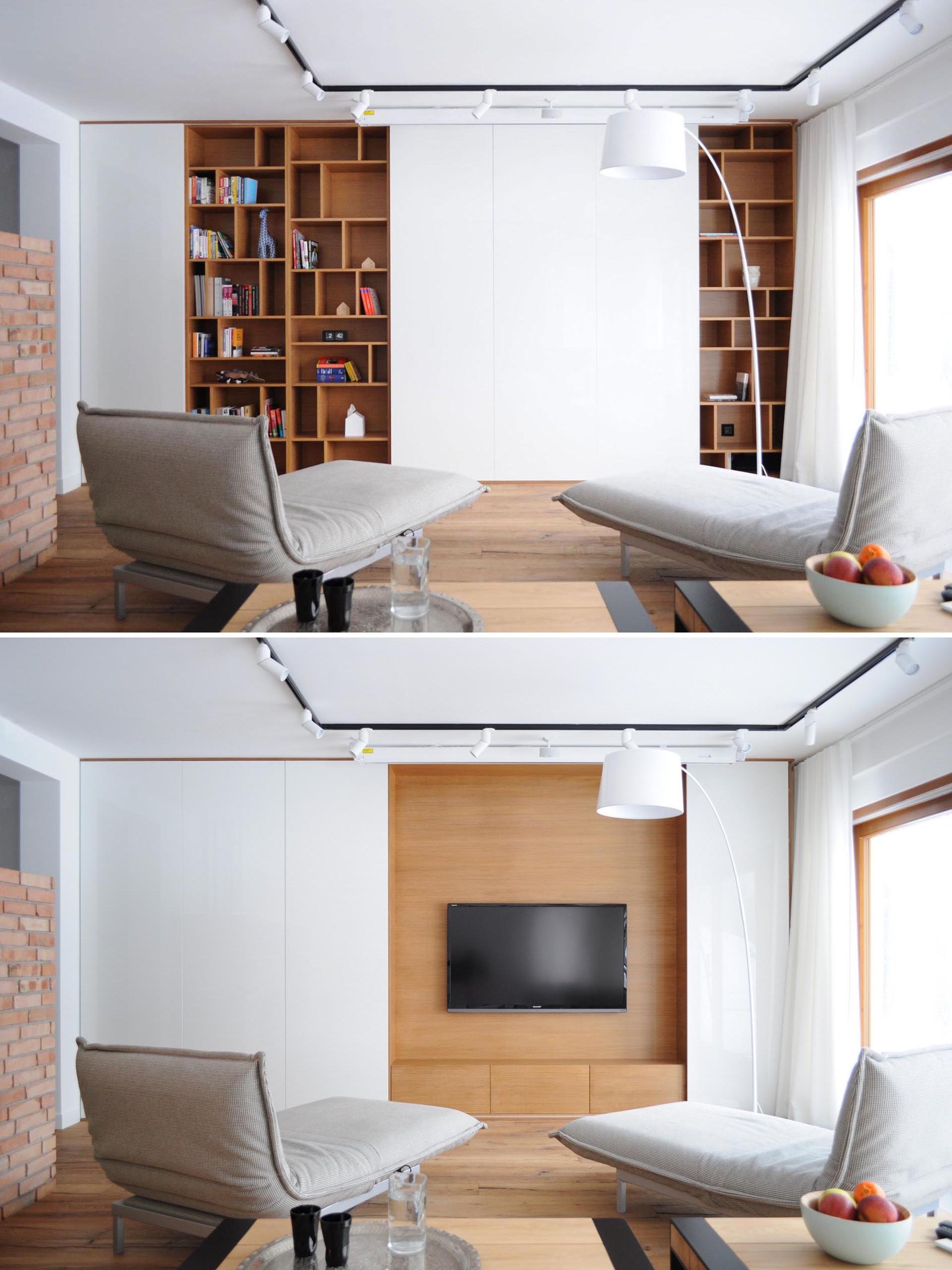 A TV is hidden behind sliding white wall panels.