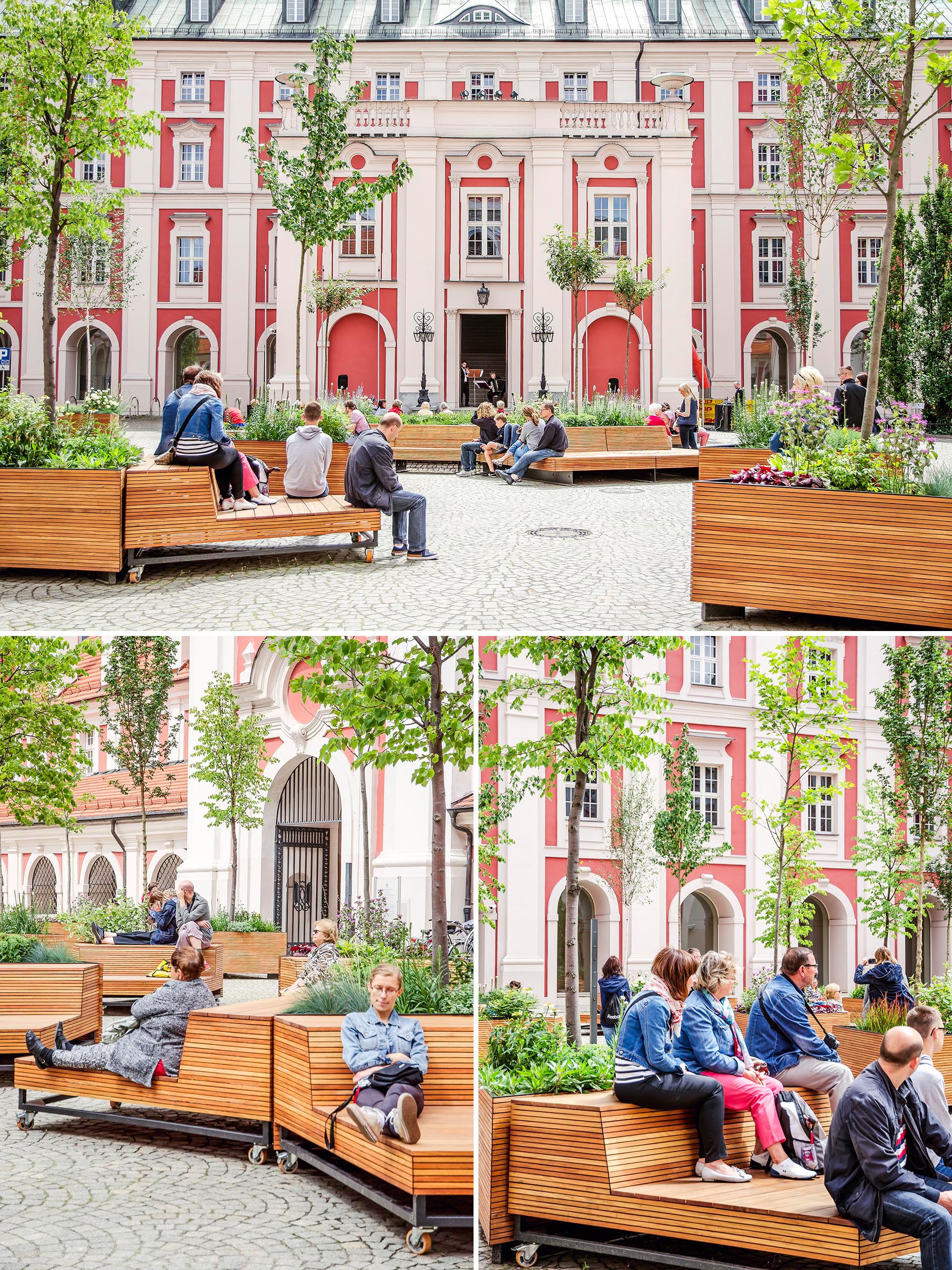 Mobile wood benches rest against triangular planters in a courtyard.