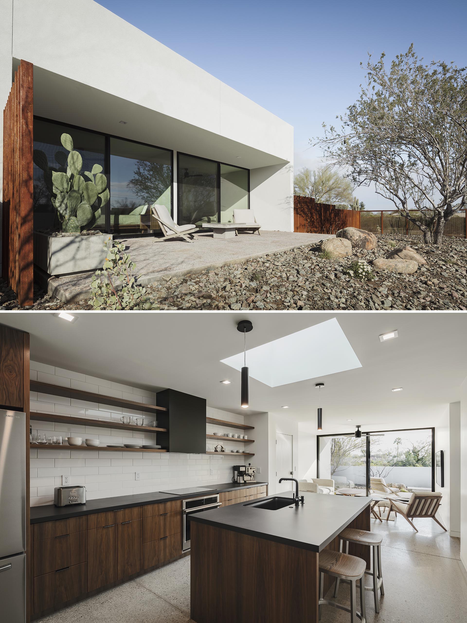 A modern guest house in the desert with an open plan living room and kitchen.