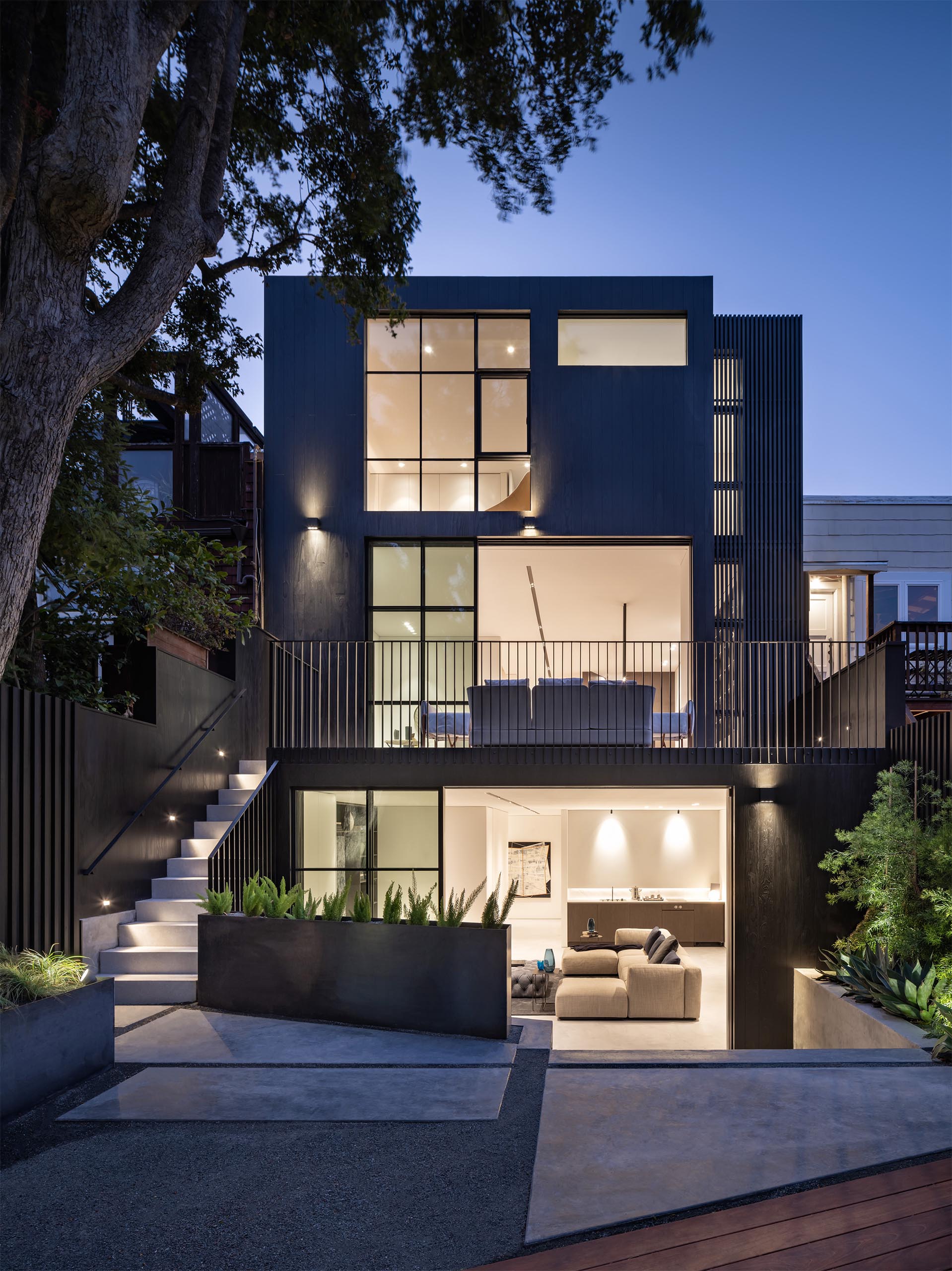 The rear of the house with custom designed planters.