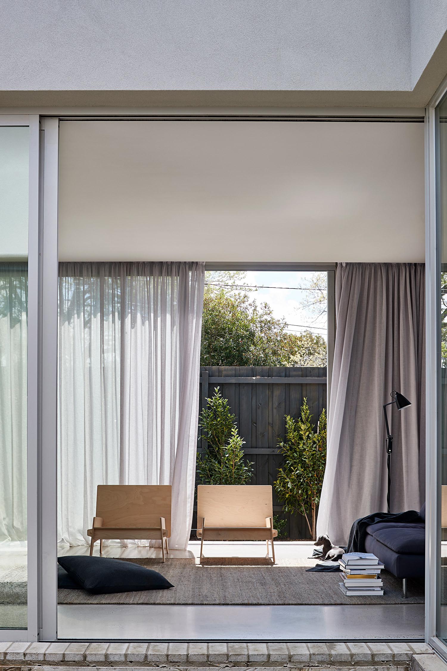 Modern living room with wood chairs.