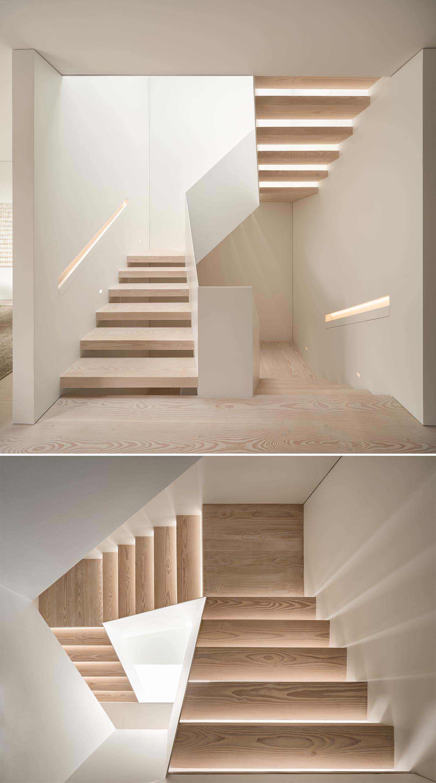 Light wood and white stairs have built-in handrails with hidden lighting.