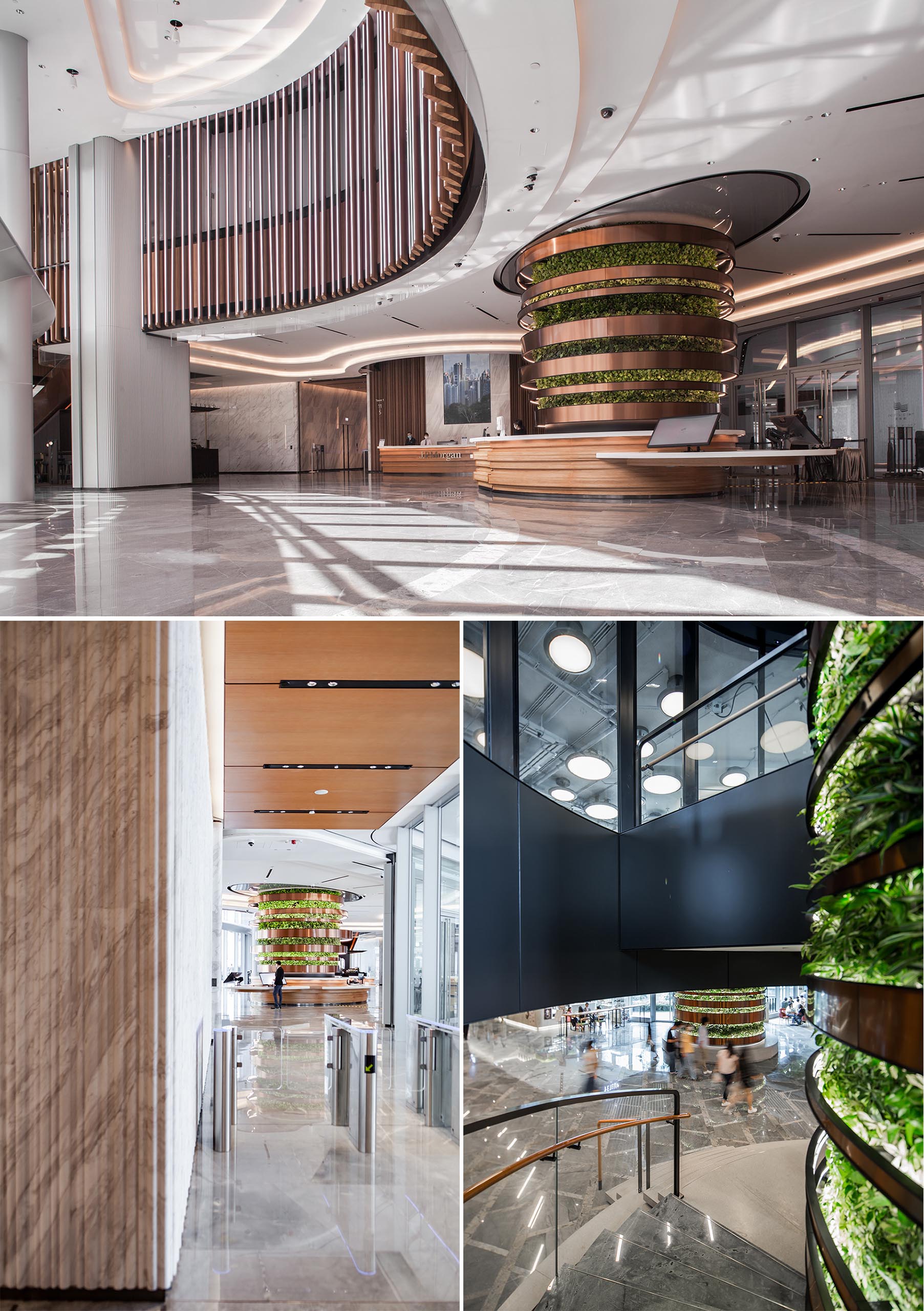 An office interior with large vertical gardens that are in the shape of columns.