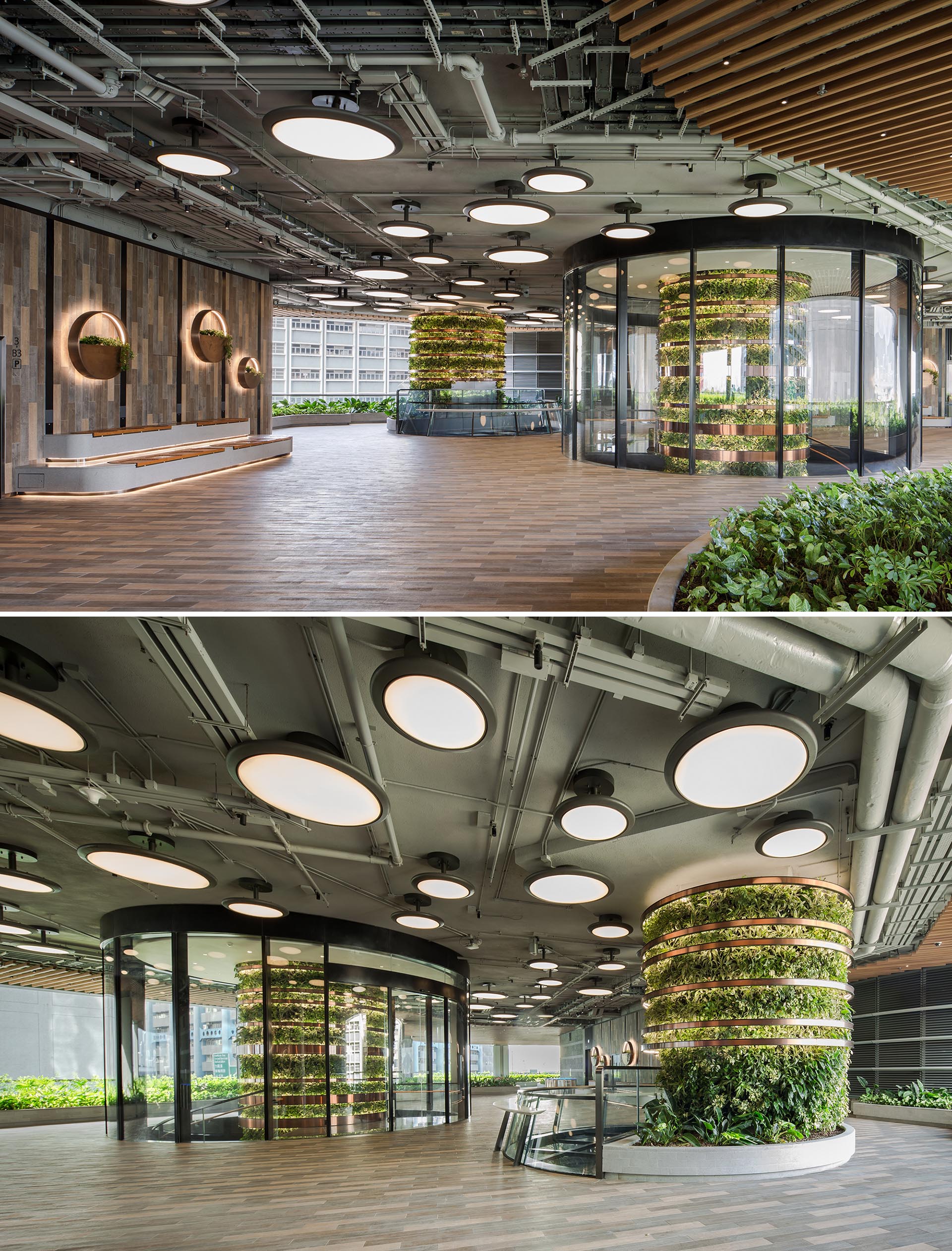 Vertical gardens in the shape of columns traverse multiple floors of an office building.