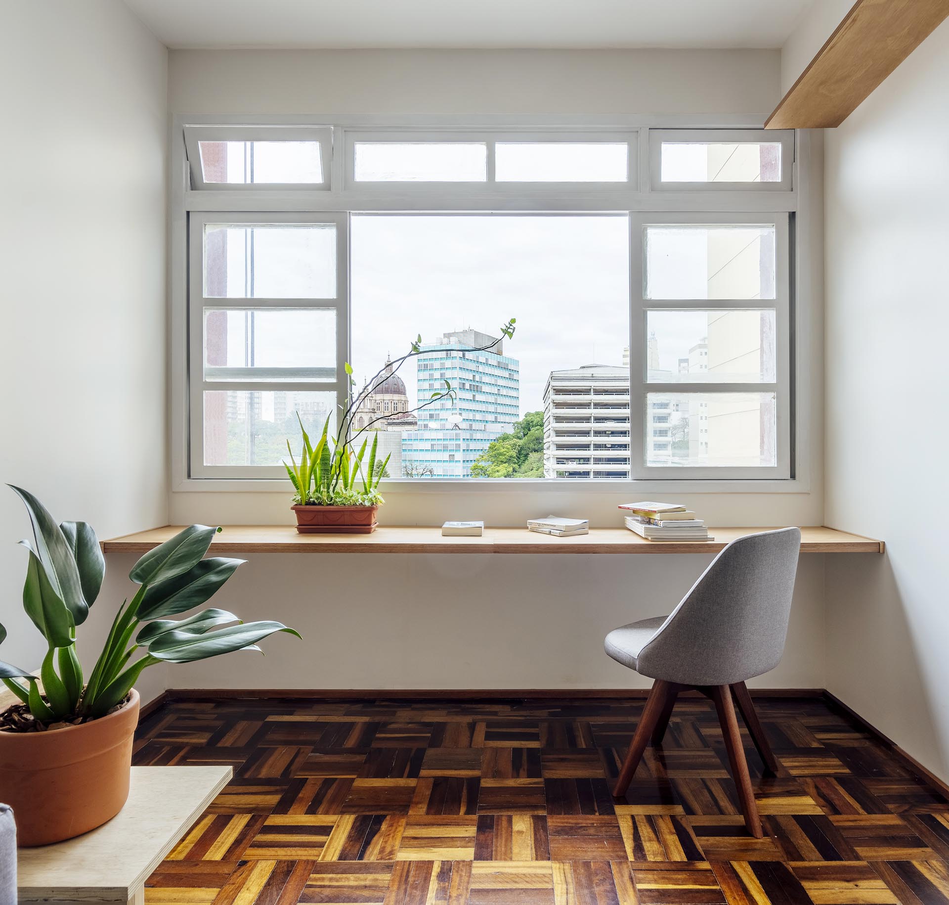 A simple home office was created using a wood desk top.