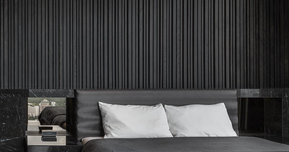 This Bedroom's Textured Accent Wall Was Made With A Variety Of Black  Stained Vertical Wood Slats