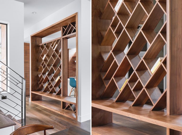 An Entryway With A Bench And Diagonal Shelves Provides A Glimpse Of The Kitchen When You Step Inside This House