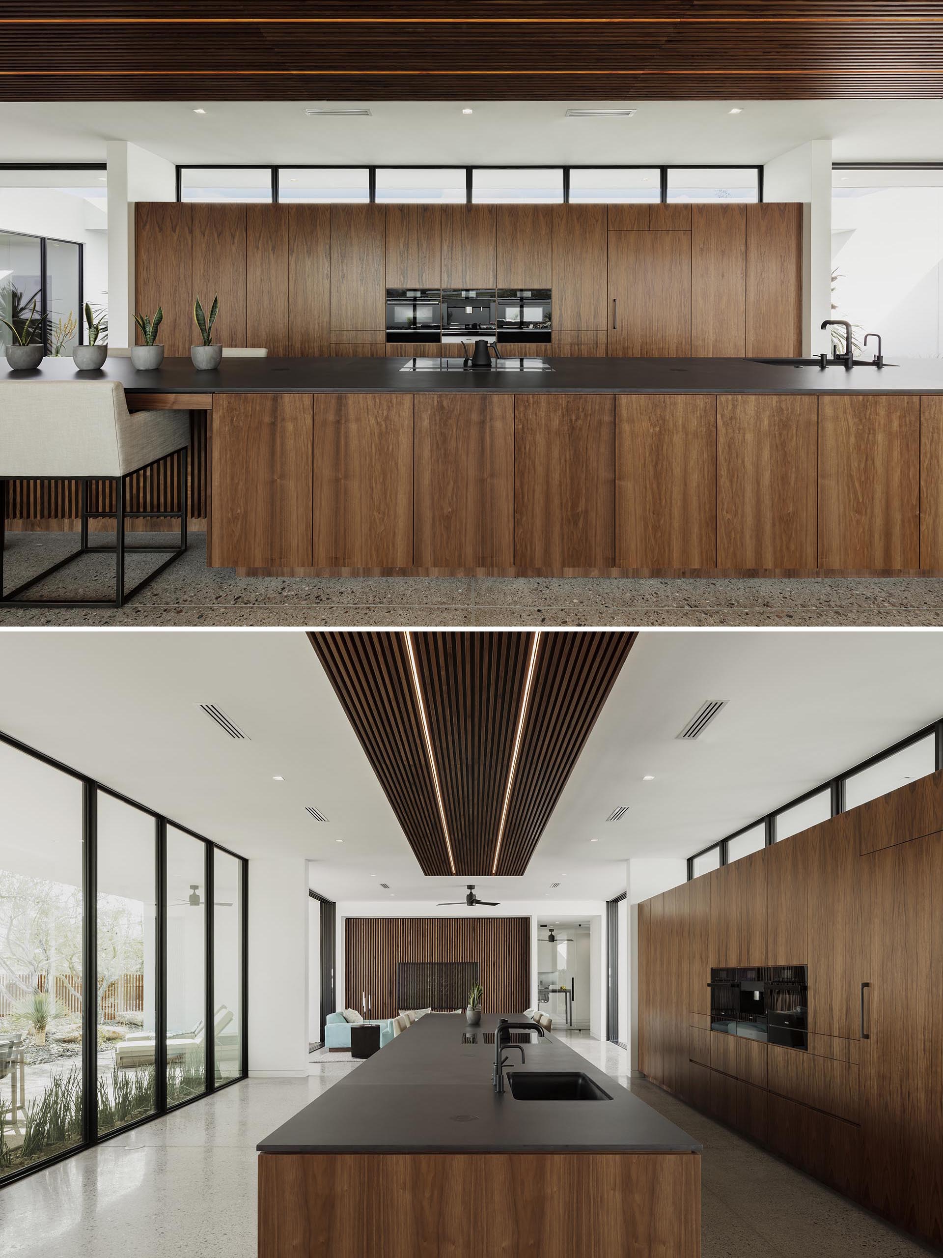 A modern wood and black kitchen.