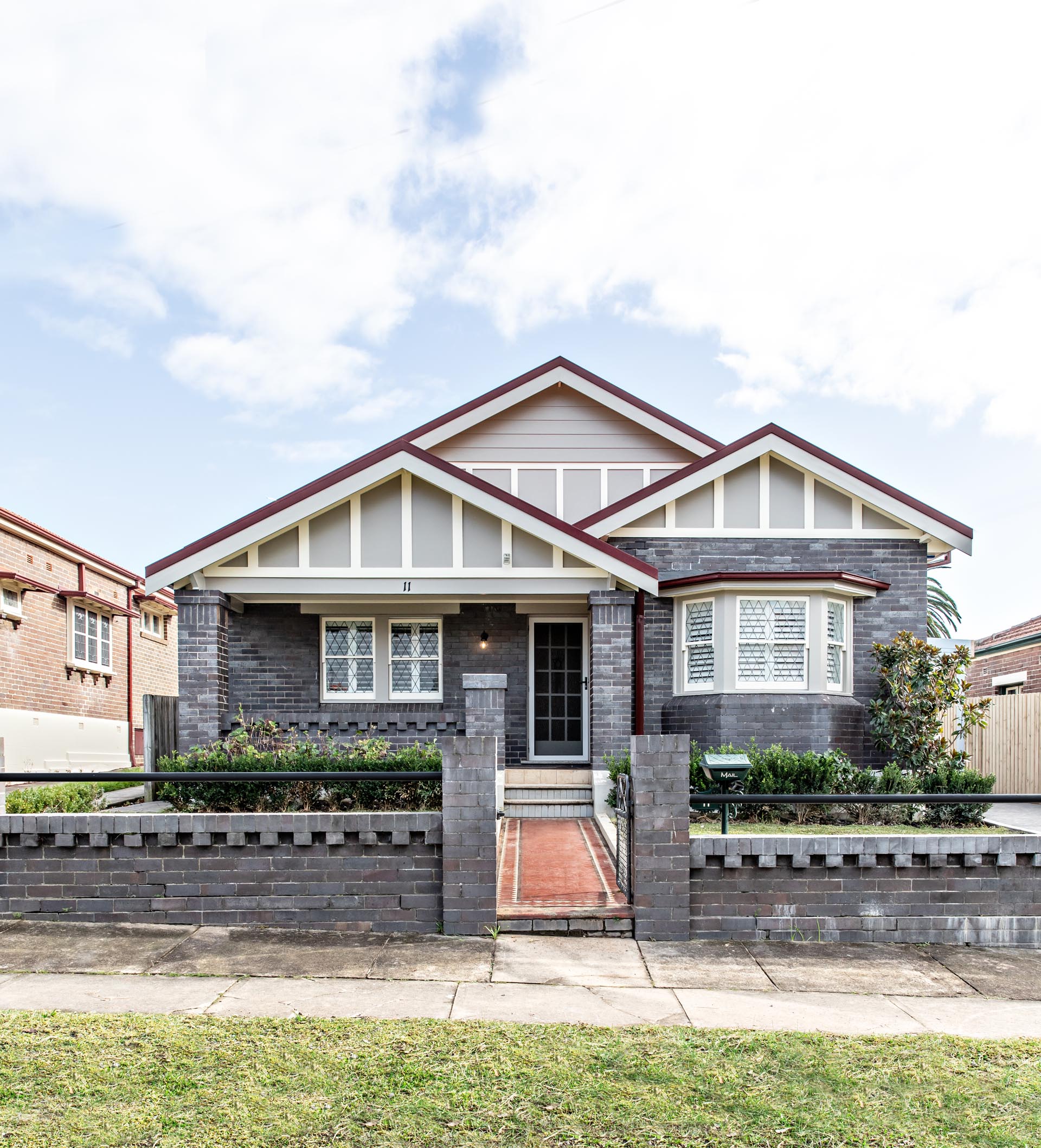 An Australian heritage house with grey brick.