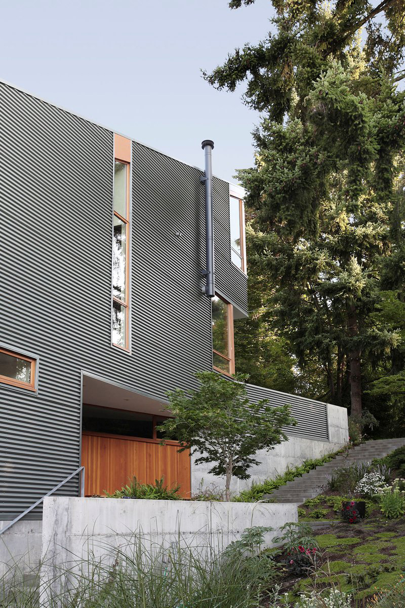 A modern house with corrugated metal siding.