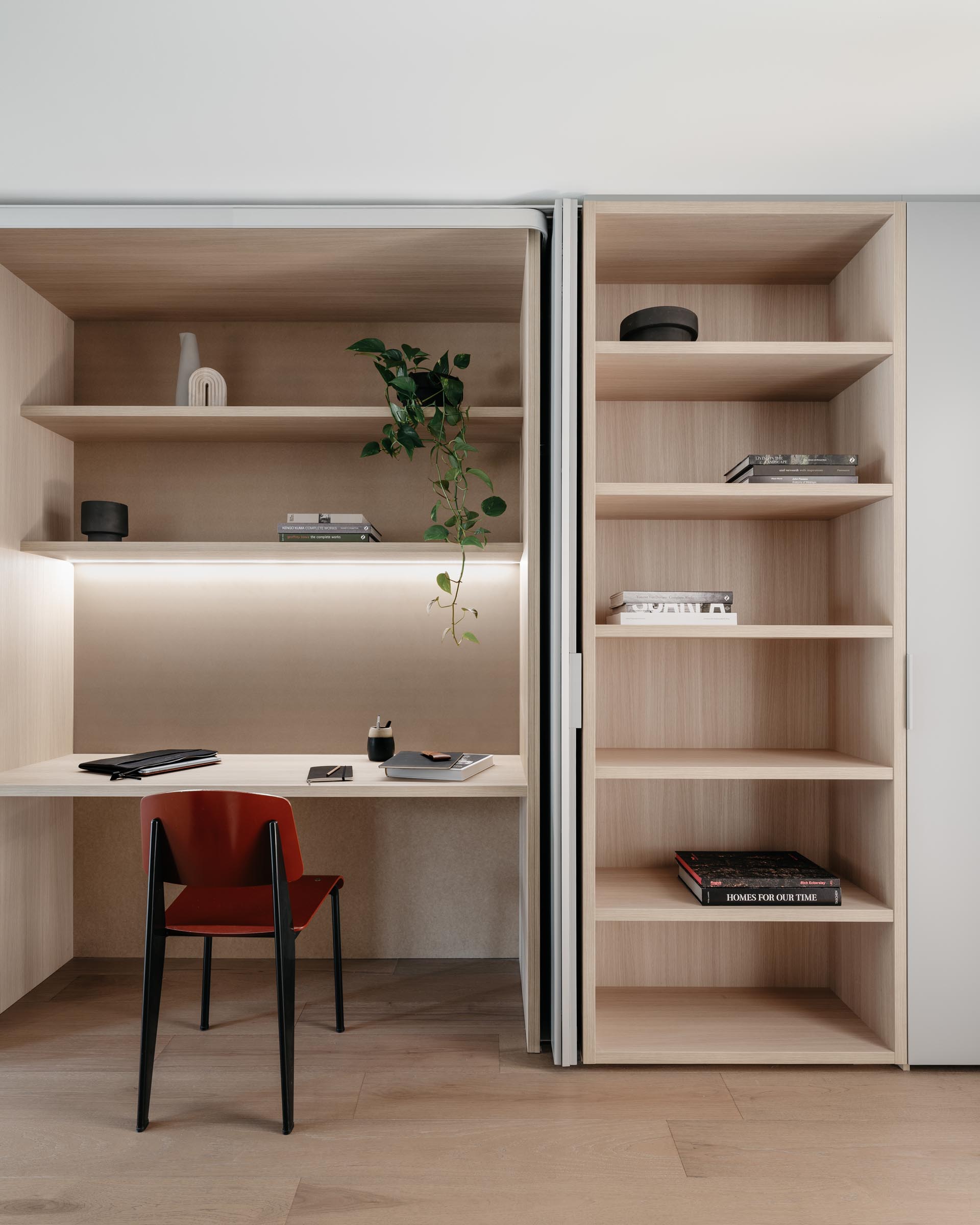 A Home Office In A Wall Of Cabinets Is A Good Idea For Apartment Living