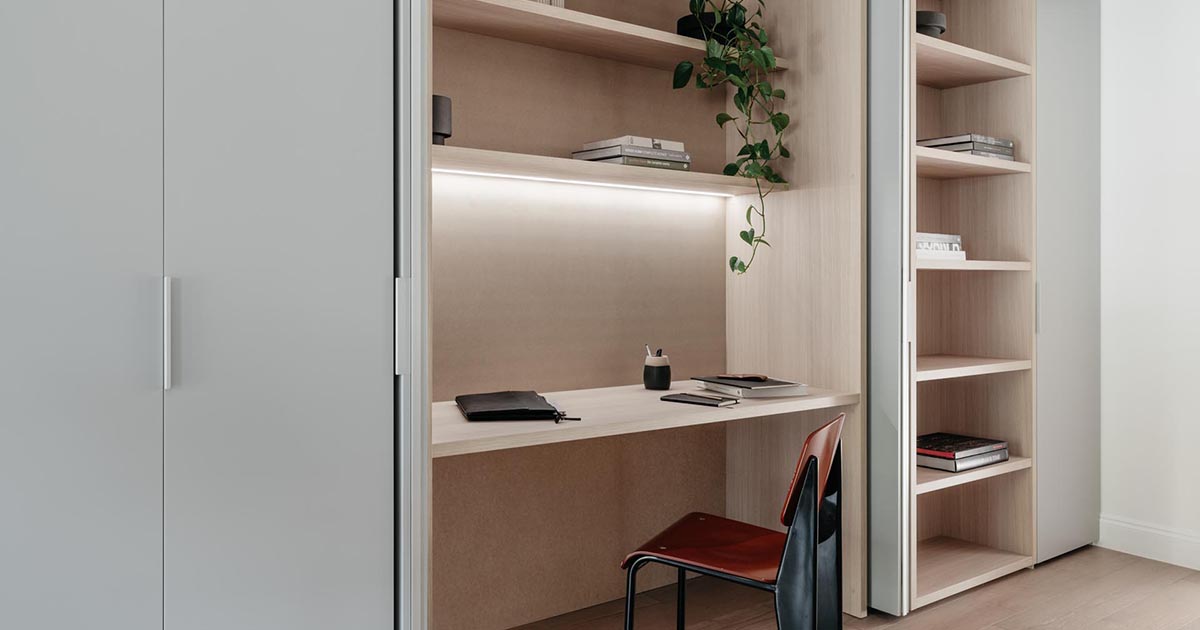 A Home Office In A Wall Of Cabinets Is A Good Idea For Apartment Living