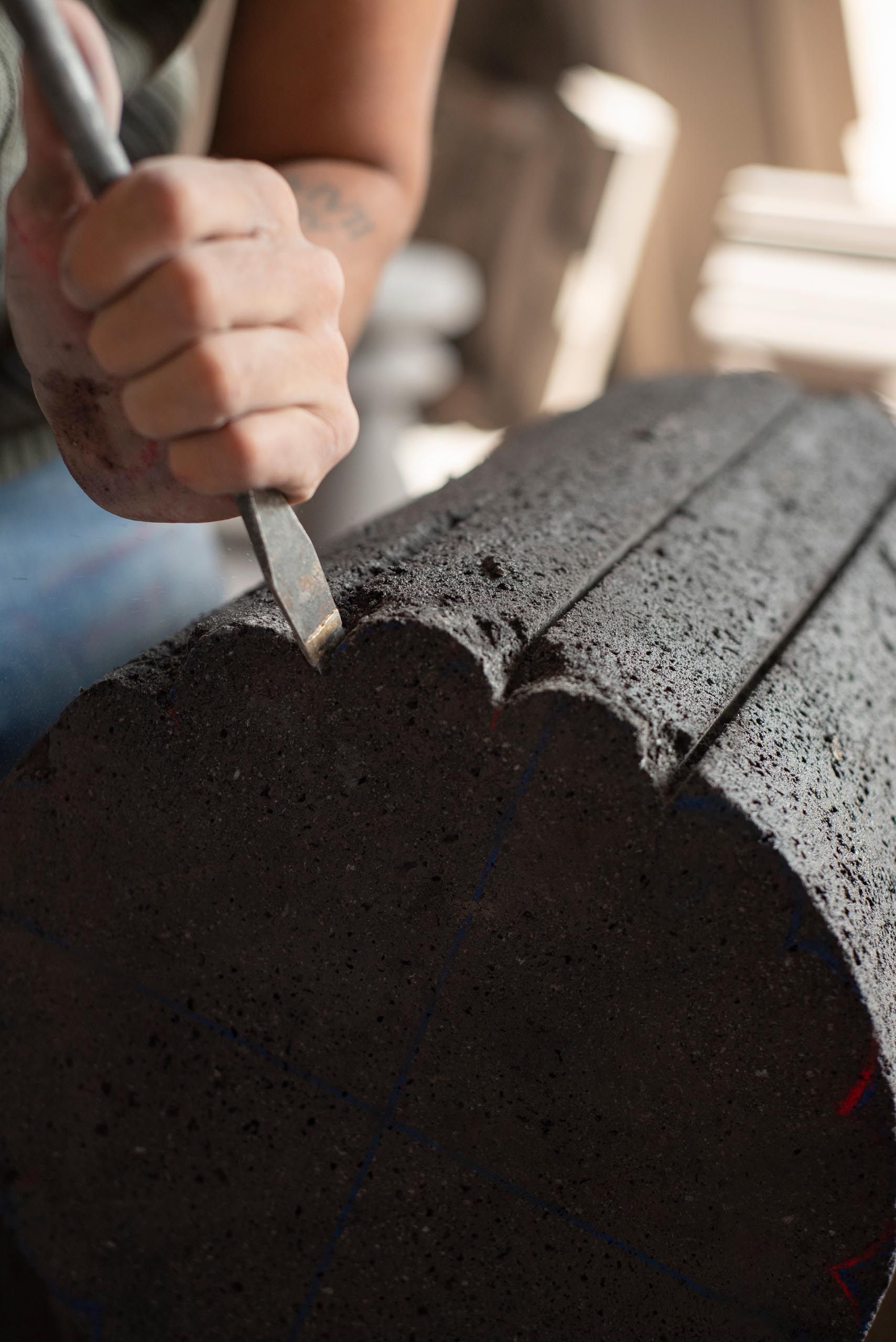 The making of a side table from volcanic rock.