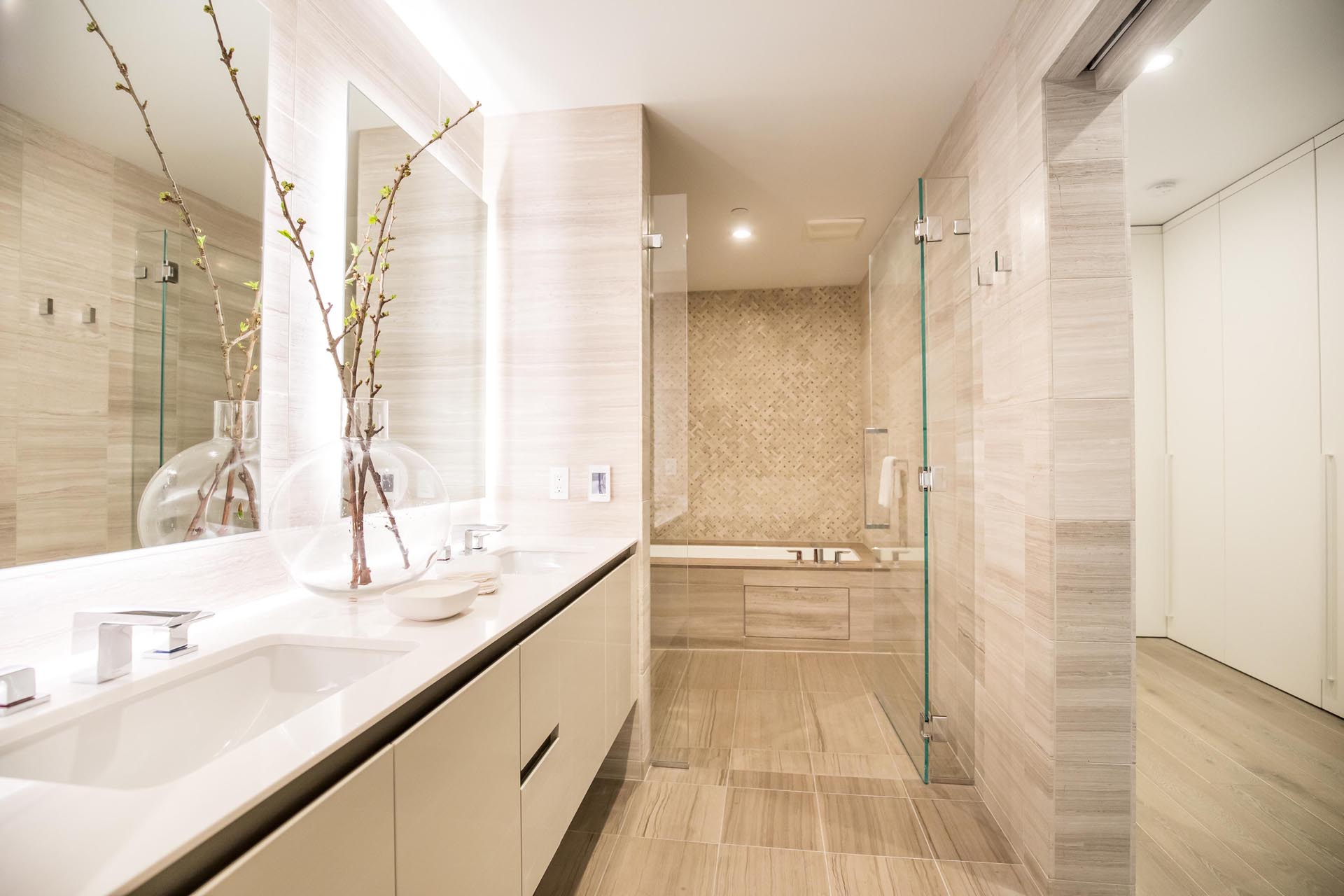A modern bathroom with a neutral color palette.