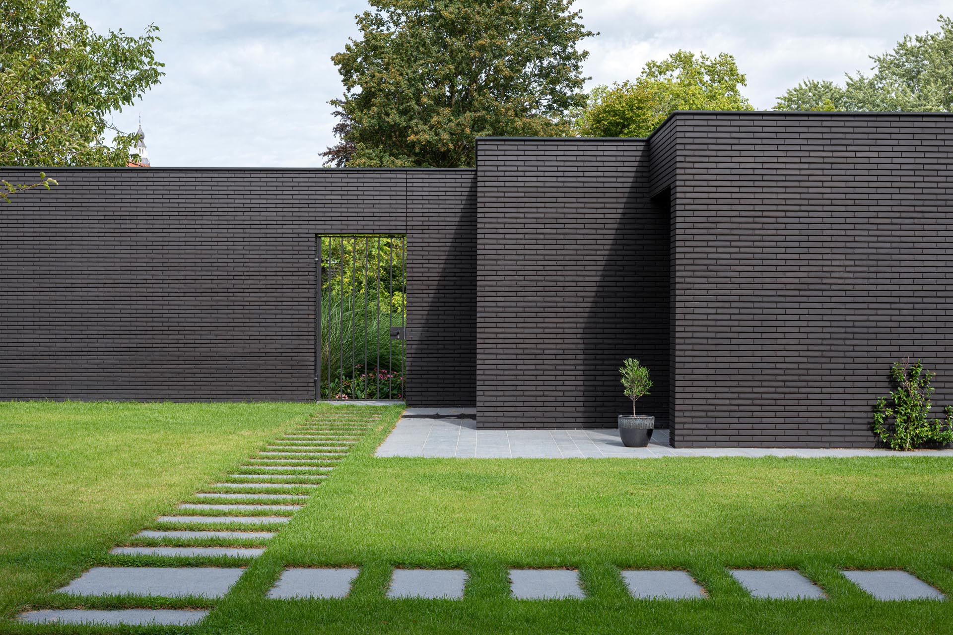 Modern house with a black brick exterior