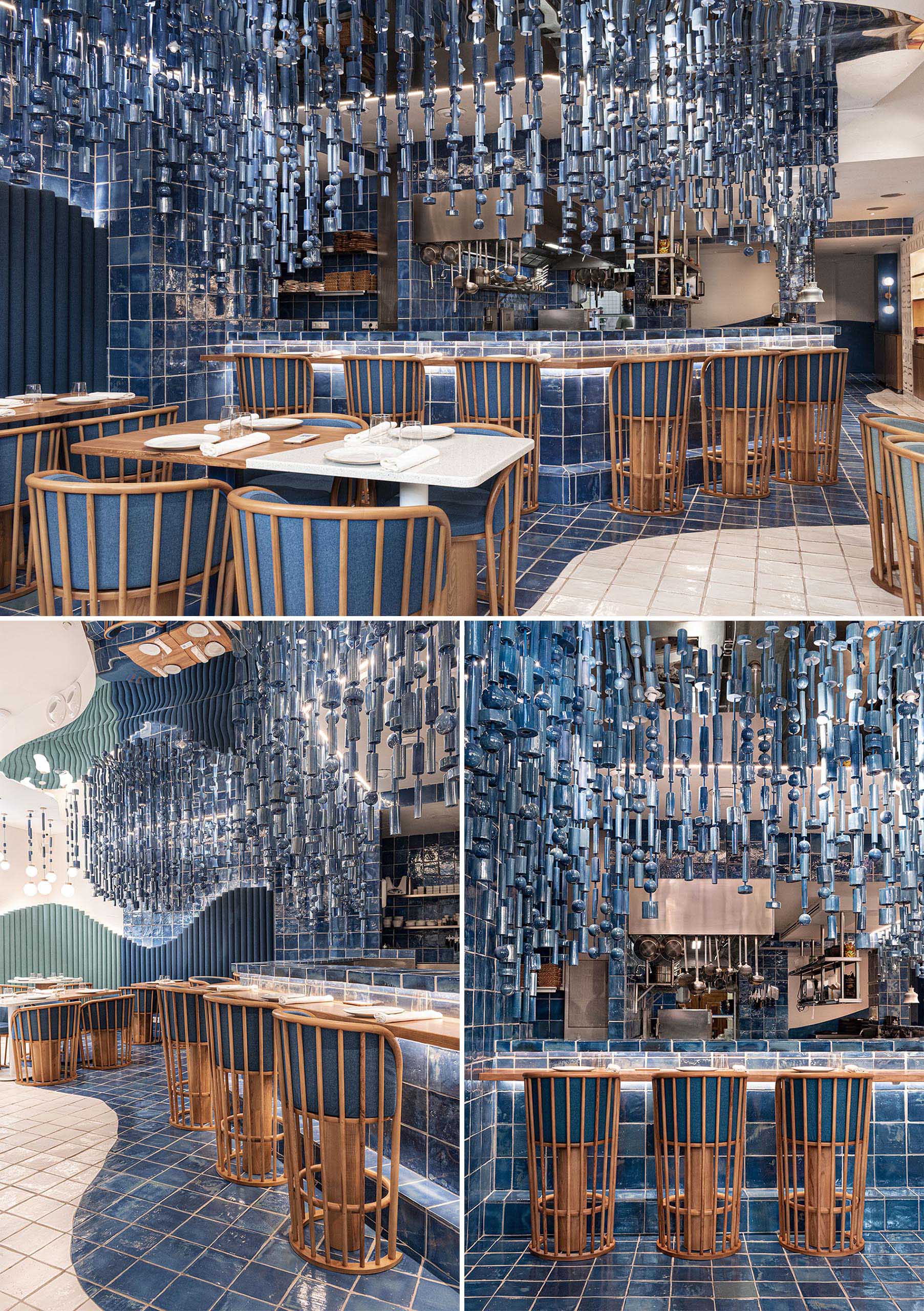 A modern restaurant with hanging blue ceramic pieces was inspired by the sea.