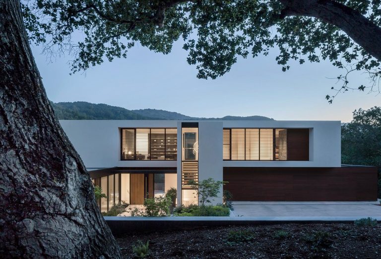 Windows Slice Through The Solid Exterior Of This Modern Home In California