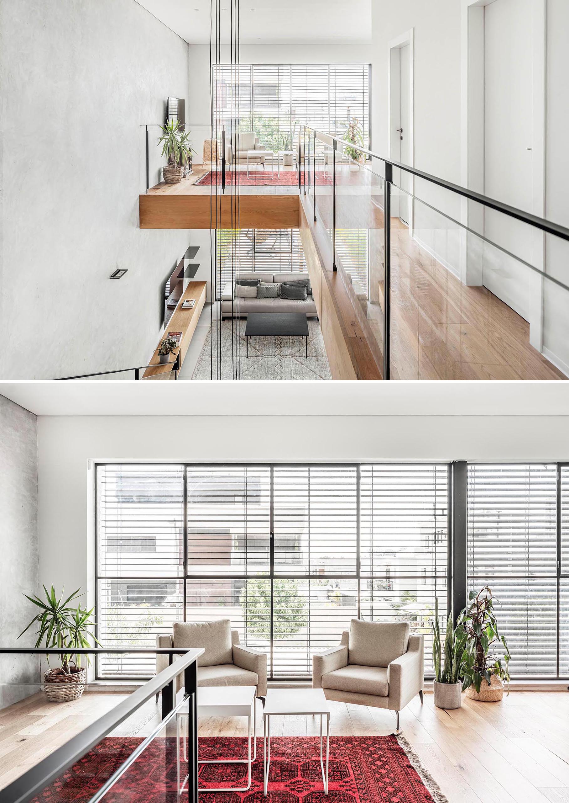 The top of this wood staircase opens to a walkway that leads to a small sitting room. The railing, composed of iron and glass, completes the clean and minimalist look.