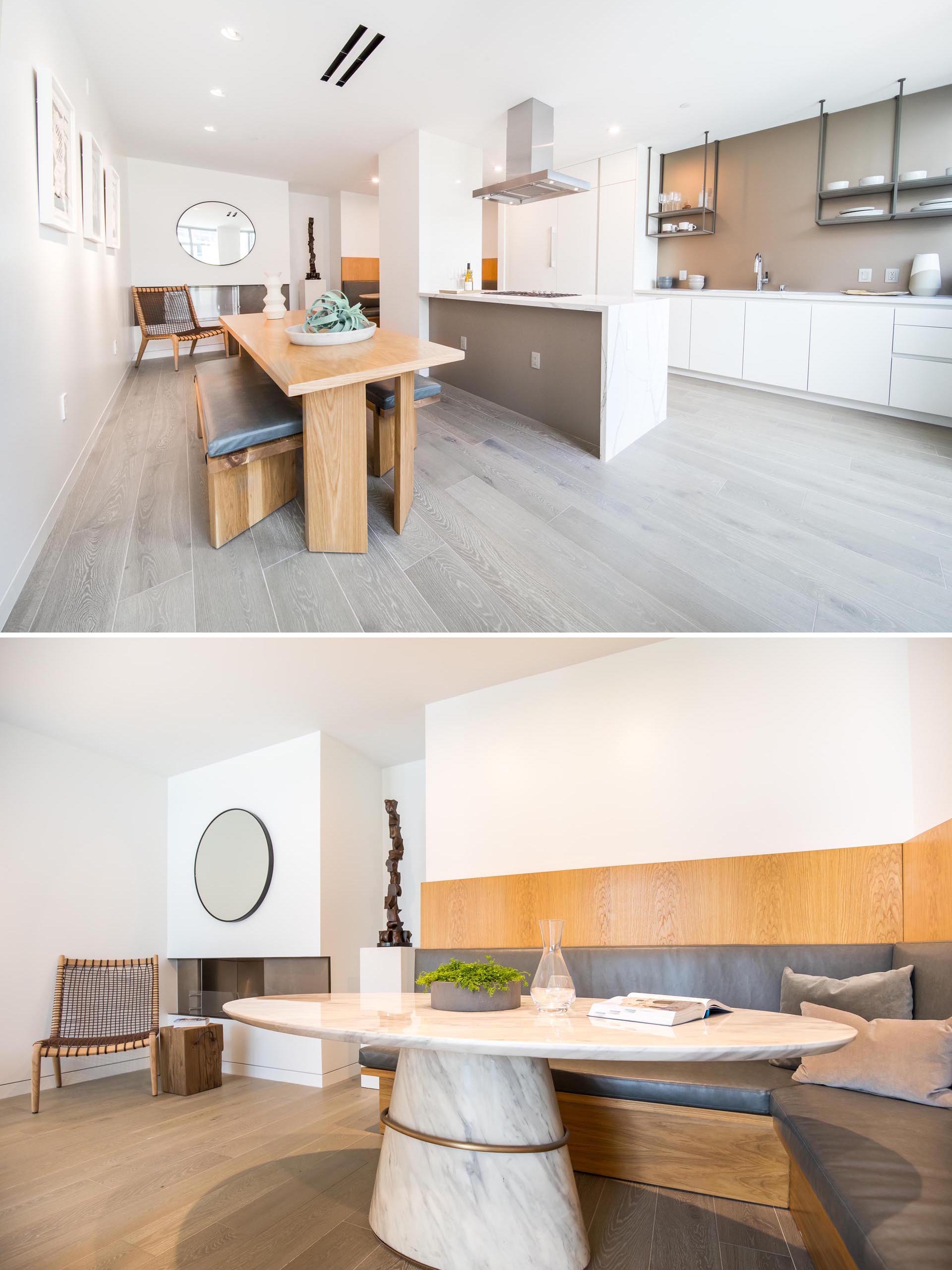 A modern kitchen and dining area with banquette seating.