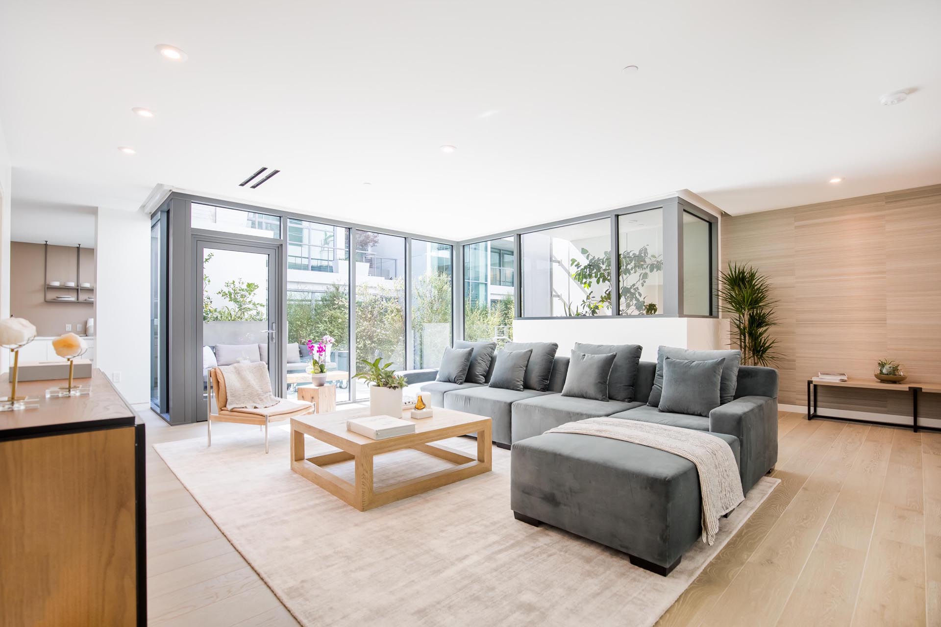 A modern living room with gray sofa.