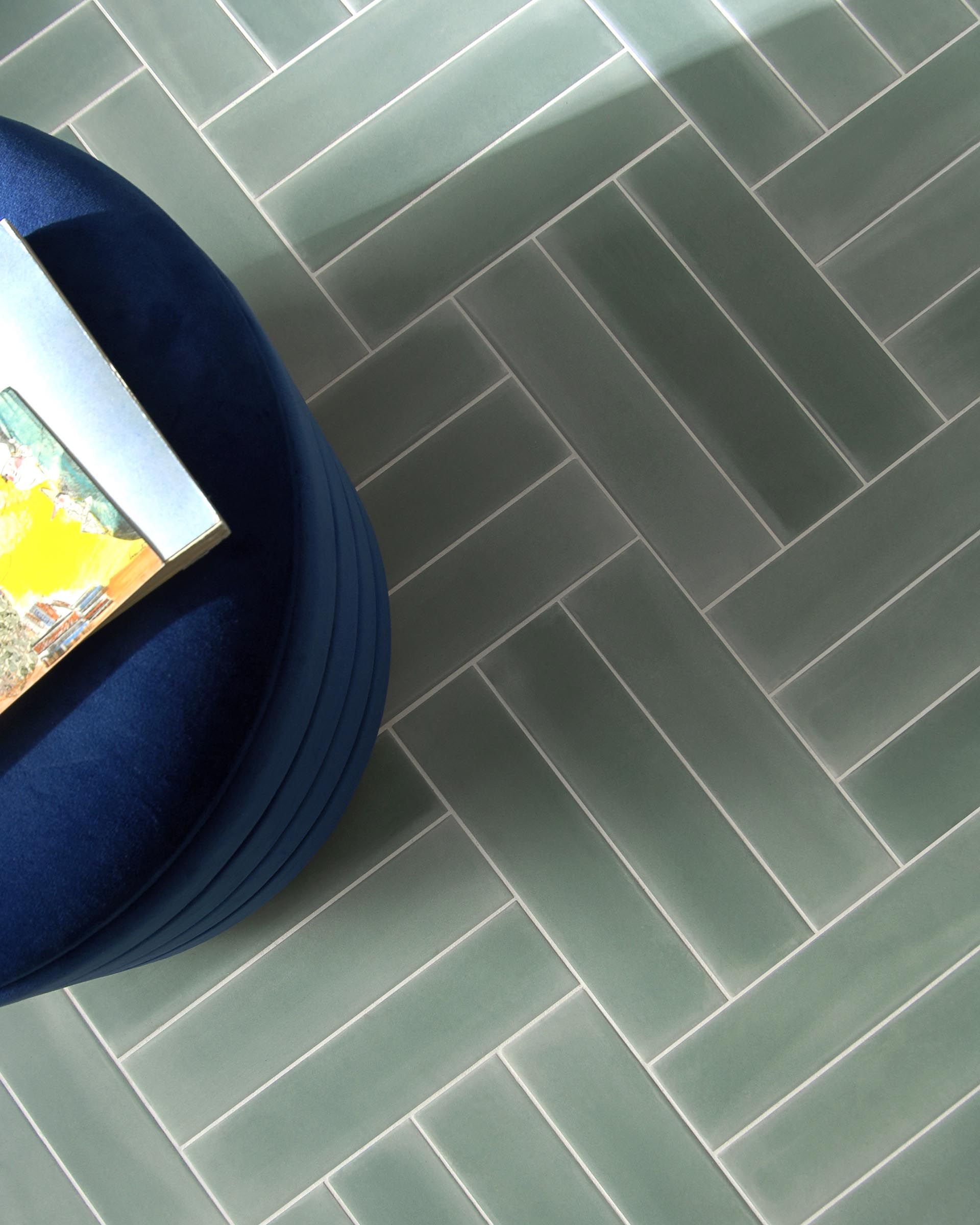 Blue-green tiles combine the tranquil effects of blue with the optimistic feeling of green.