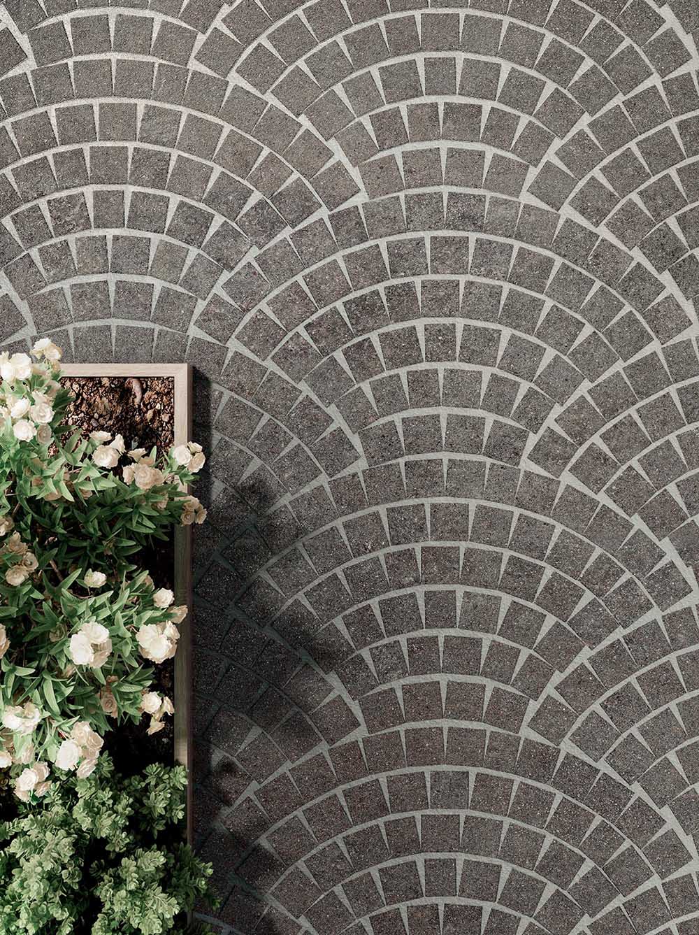 Characterized by bold geometric shapes and decadent details, deco tiles feature chevron patterns, arches of contrasting marble, and scallops full of color.