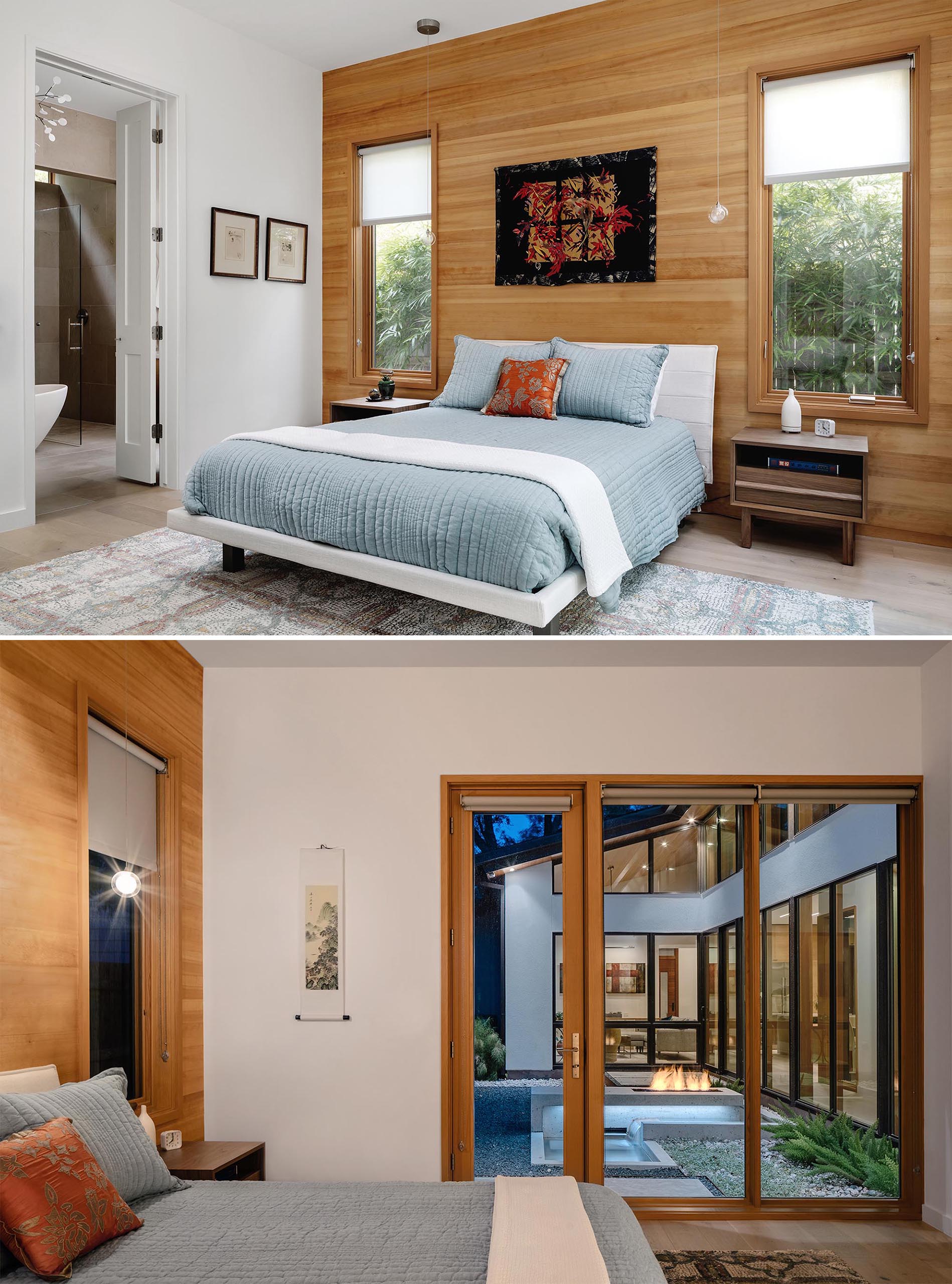 A modern bedroom with light blue bedding and a wood accent wall.