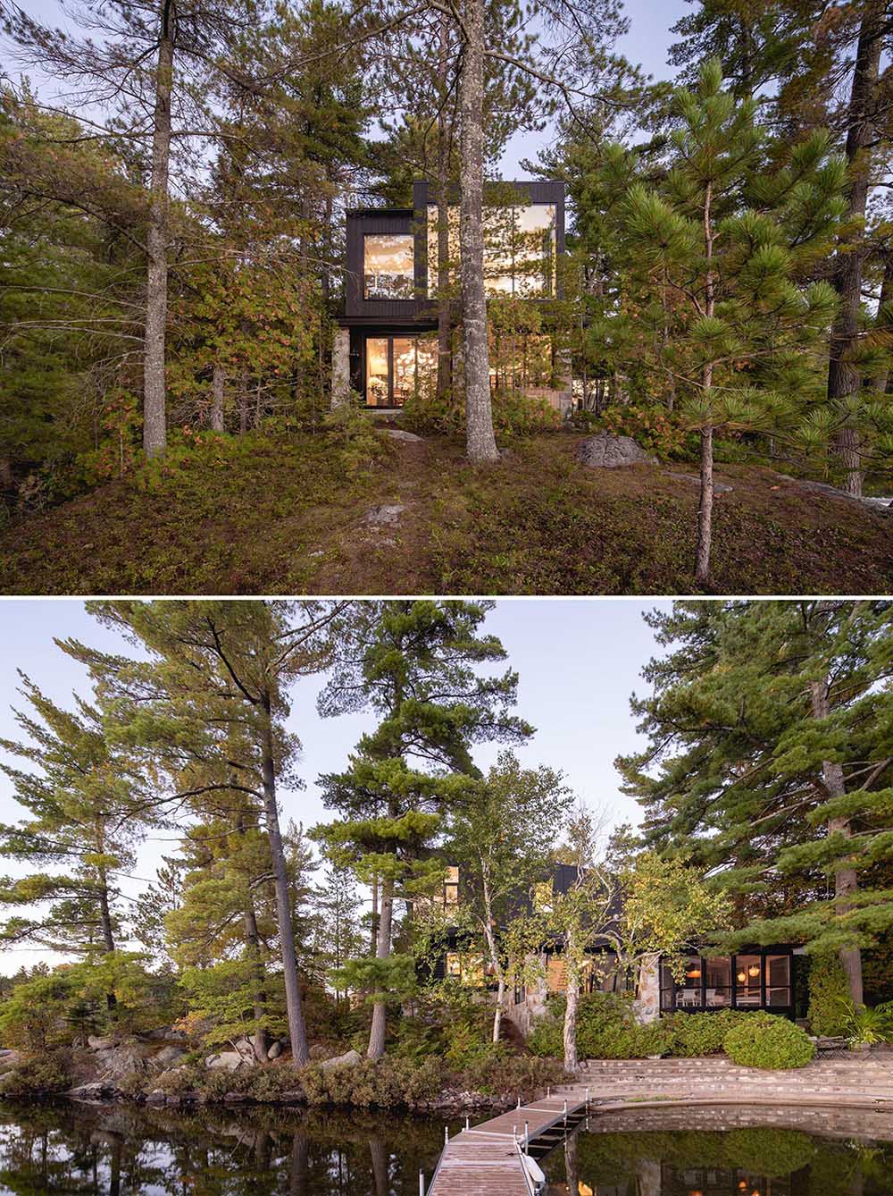 A log cabin with a stone foundation has a modern extension and screened-in porch.