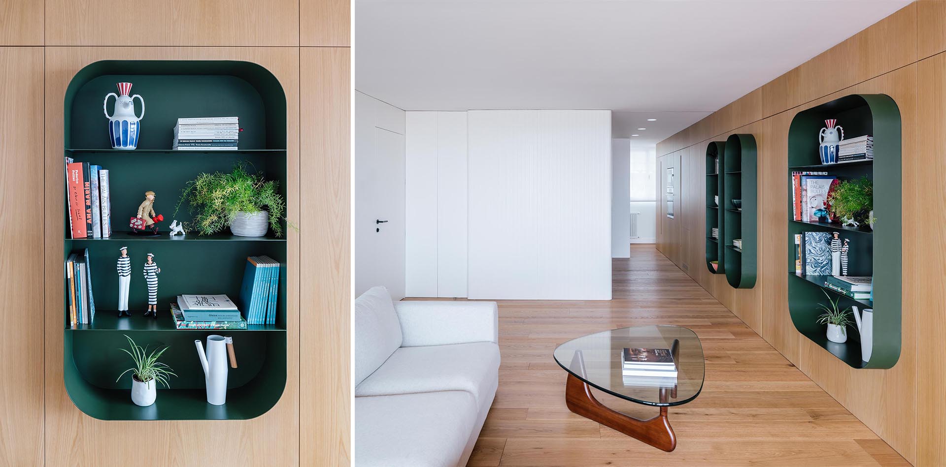 A modern apartment with dark green shelves embedded into the wall.