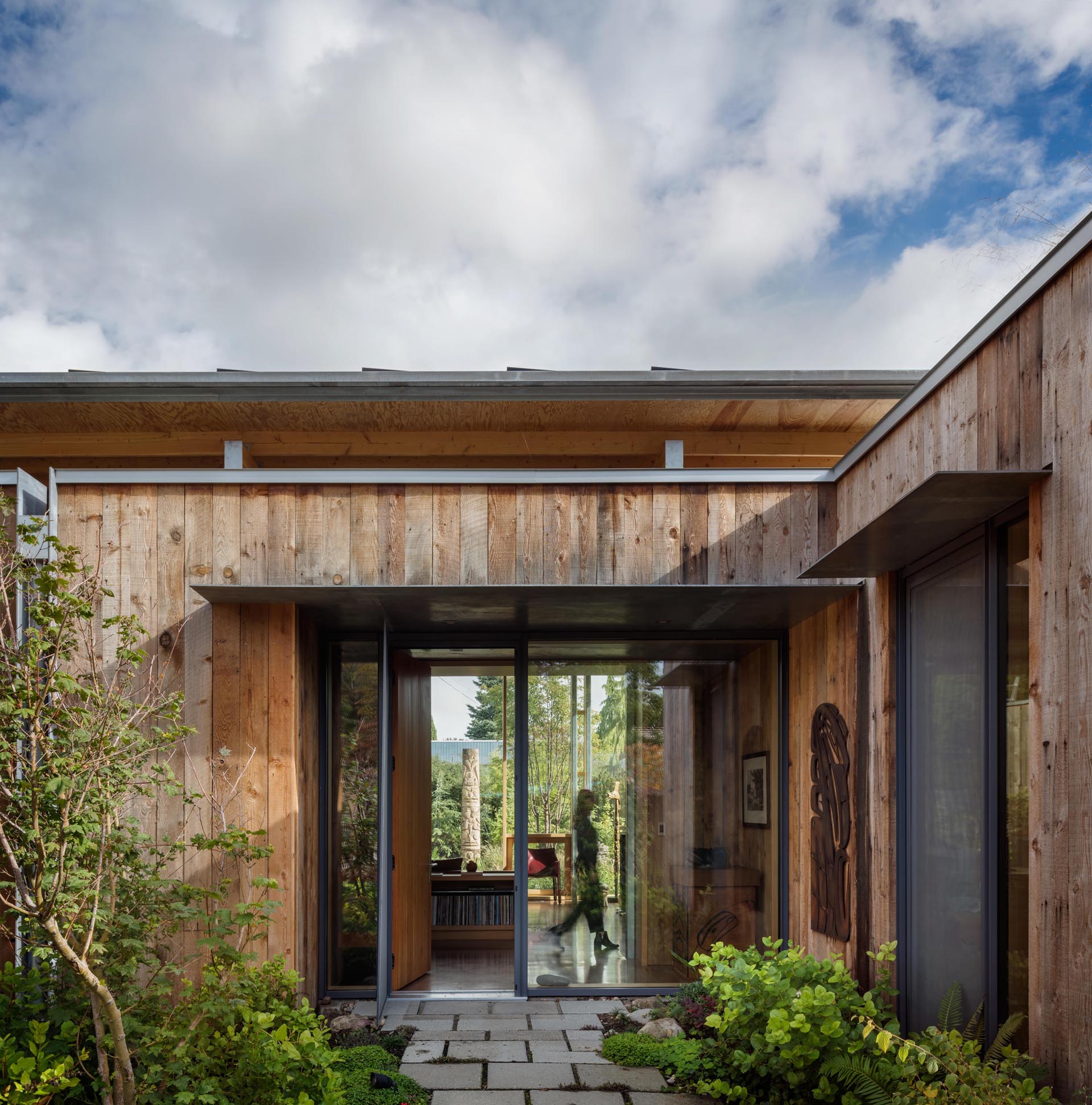 A modern cabin with fir wood exterior siding.