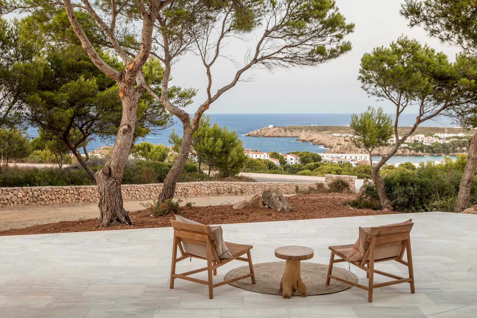 A modern patio with water views.