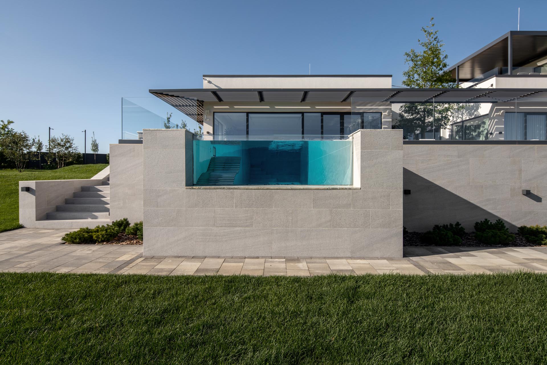 A 52ft (16m) long pool includes a window at one end, allowing the user to admire the landscape from within the pool.