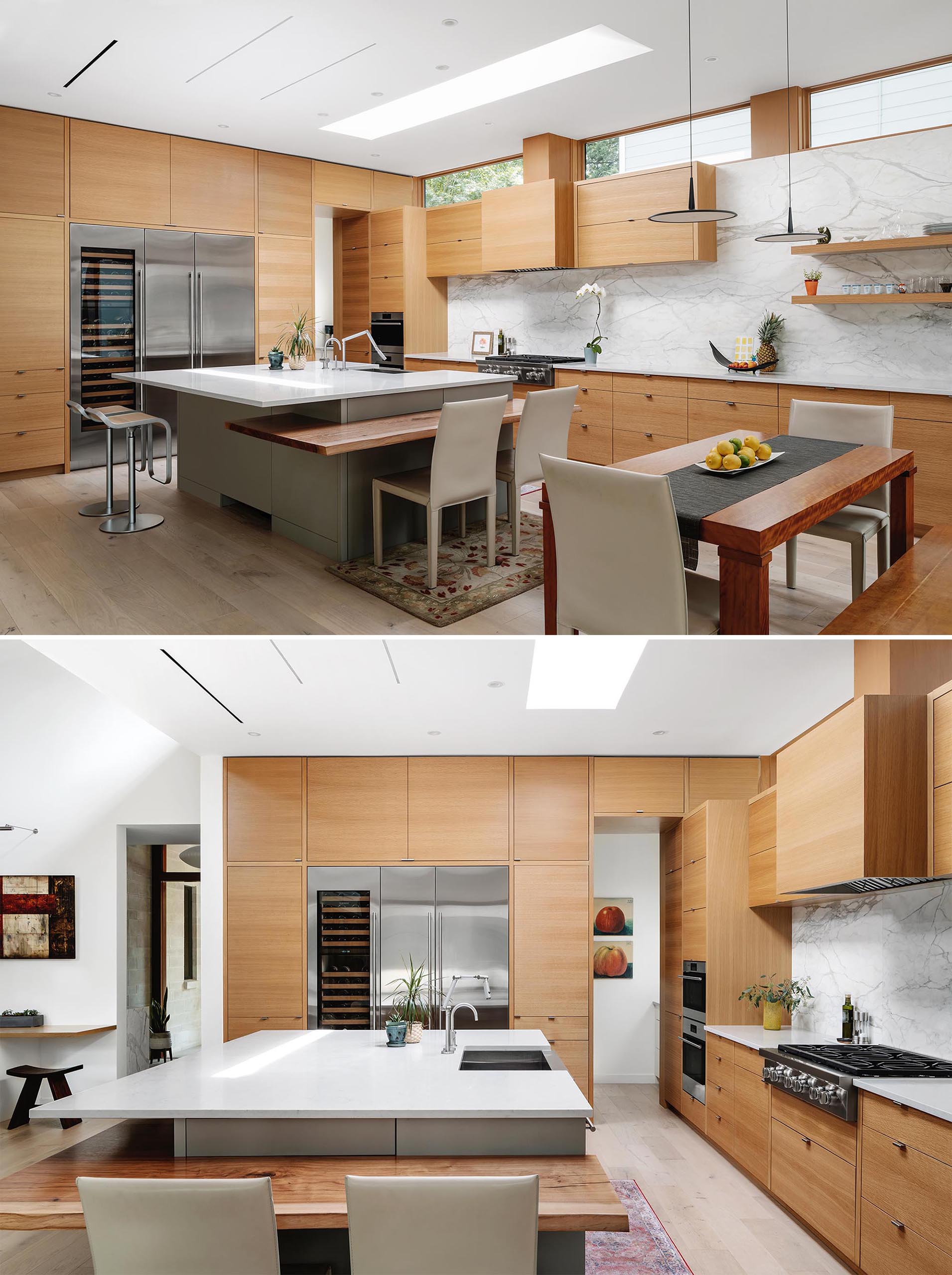 This modern kitchen has minimalist wood cabinets, a marble backsplash, and a large island with a couple of different seating options.