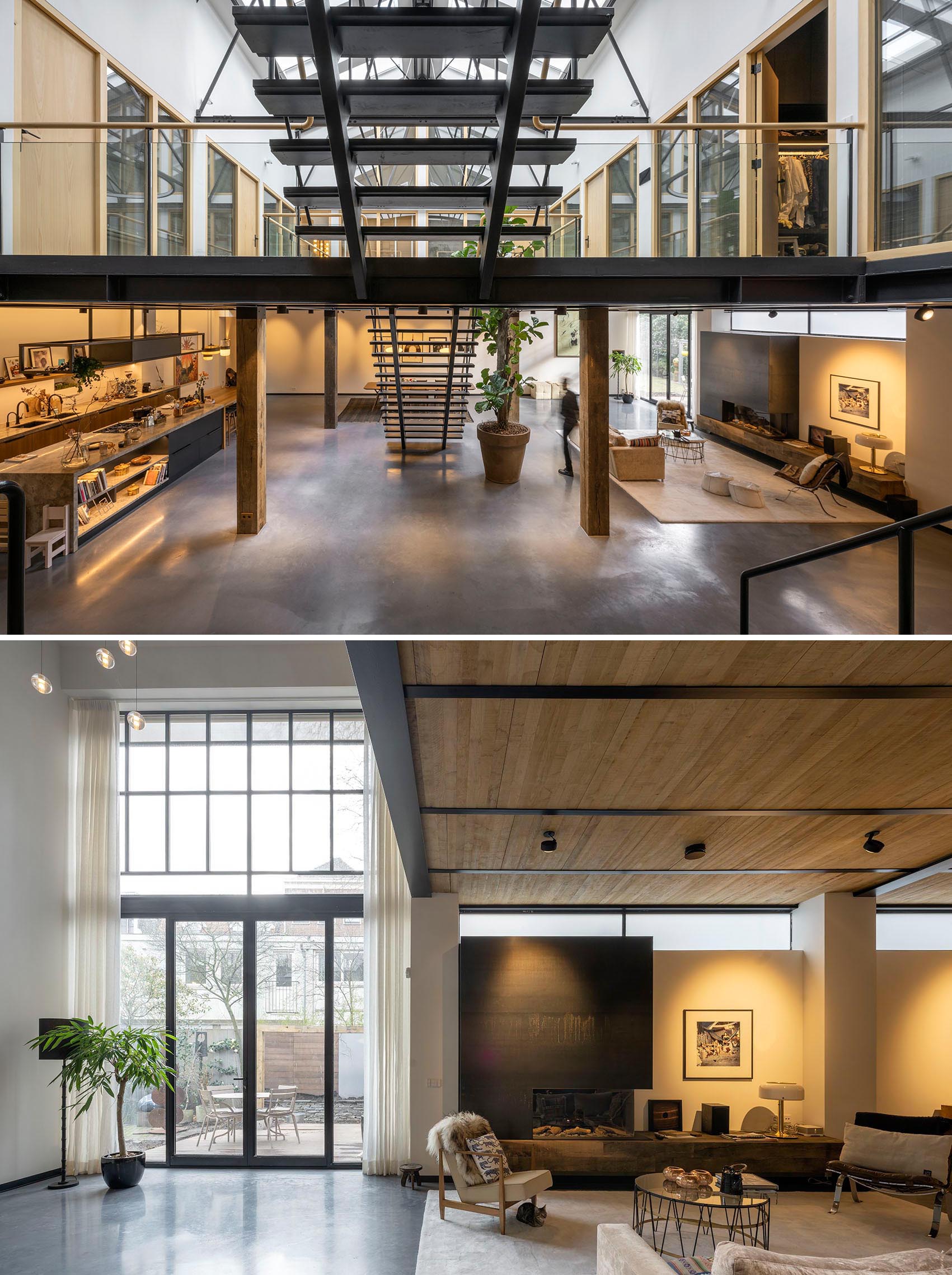 The main floor of this remodeled gymnasium, which has concrete floors, includes the living room with a fireplace on one side and a kitchen on the other.