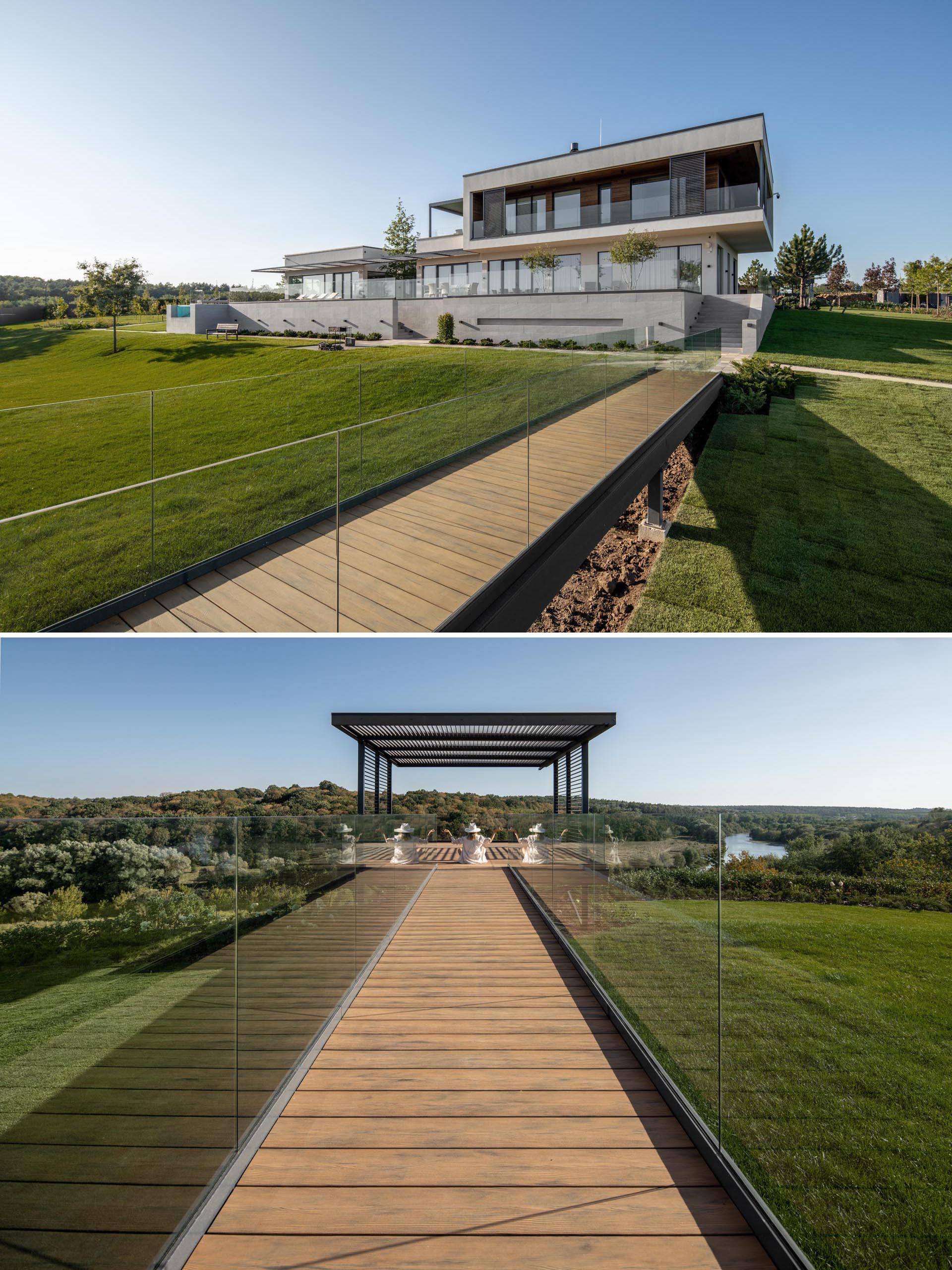 This modern home has a 49 foot (15m) bridge that leads out to a gazebo. This gazebo lets you feel like you're floating above the river, and is a place for quiet relaxation.