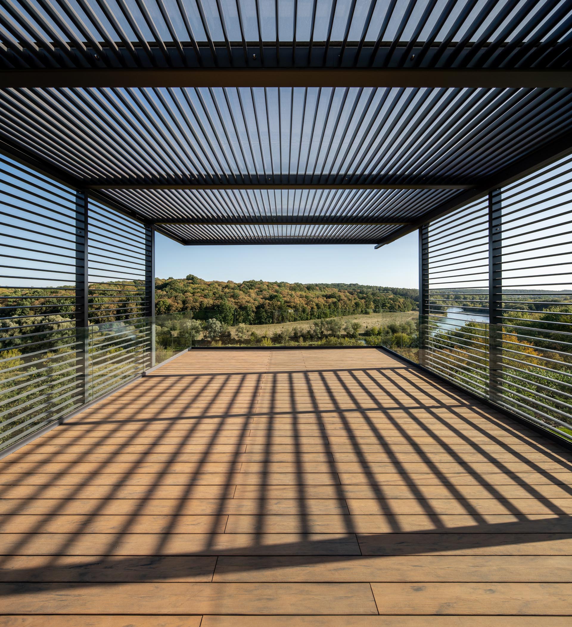 A gazebo with a view of a river.