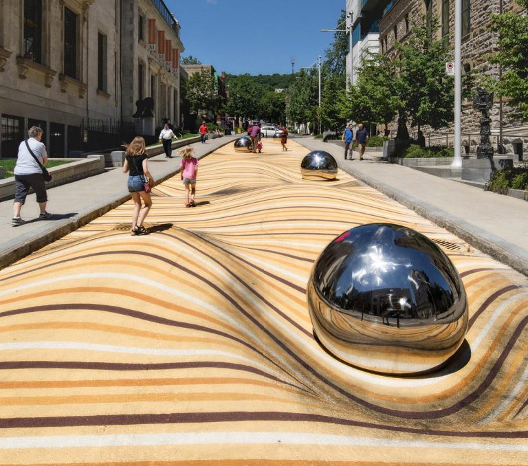 A Large-Scale Public Art Mural That Appears To Warp The Street