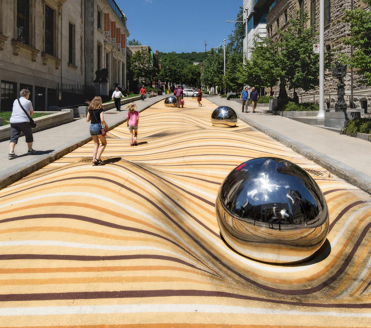 A public mural in Montreal that manipulates the street surface and creates the illusion of large ripples.