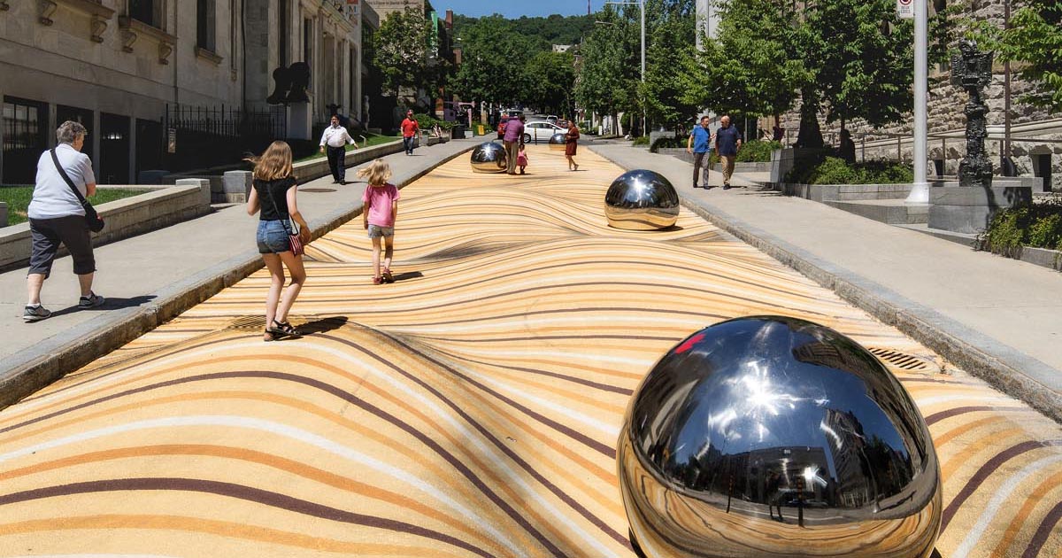 A Large-Scale Public Art Mural That Appears To Warp The Street