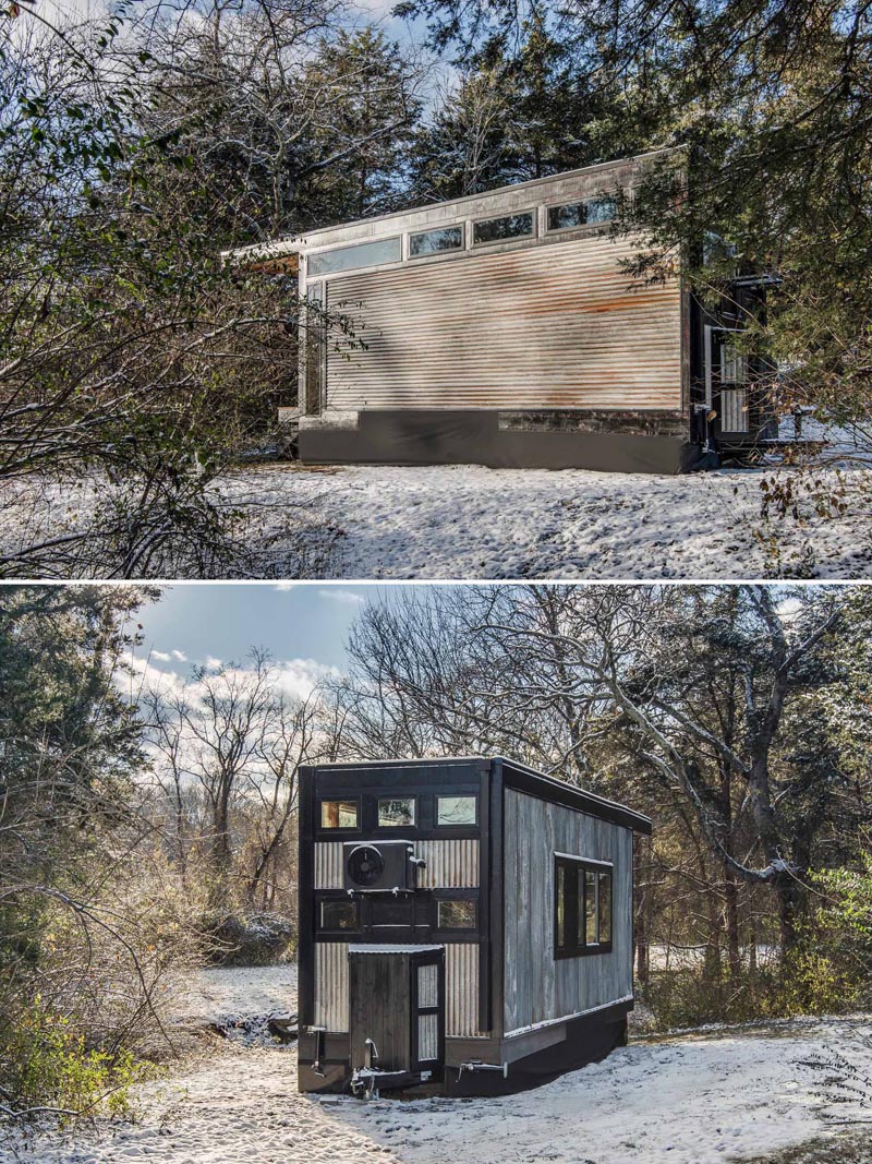 Measuring in at just 256 square feet (23sqm), this tiny house exterior showcases weathered, reclaimed corrugated tin, that's vertical on one side, horizontal on the other. 