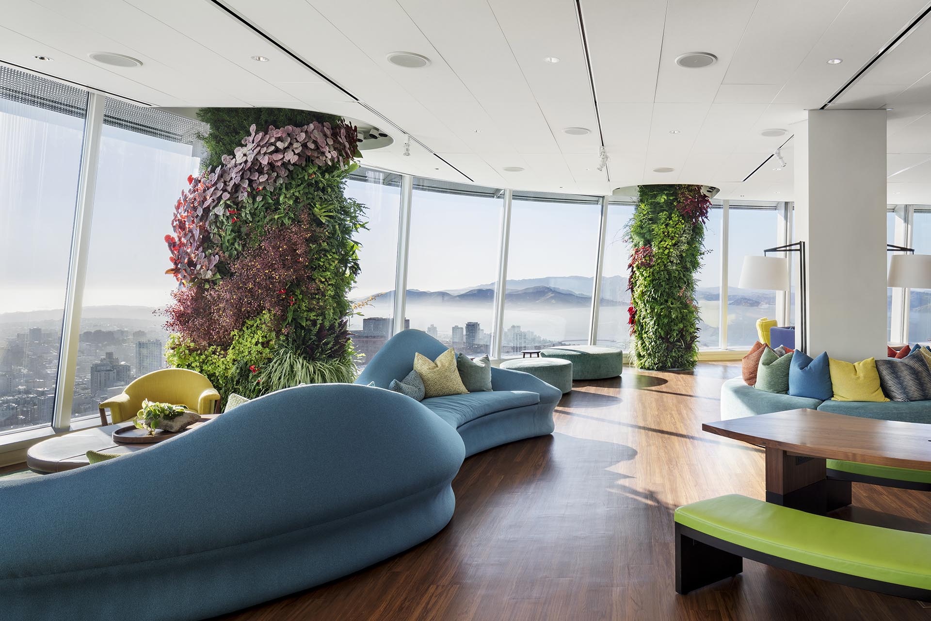 24 columns that surround a circular office floor have been remodeled to create eye-catching vertical gardens.