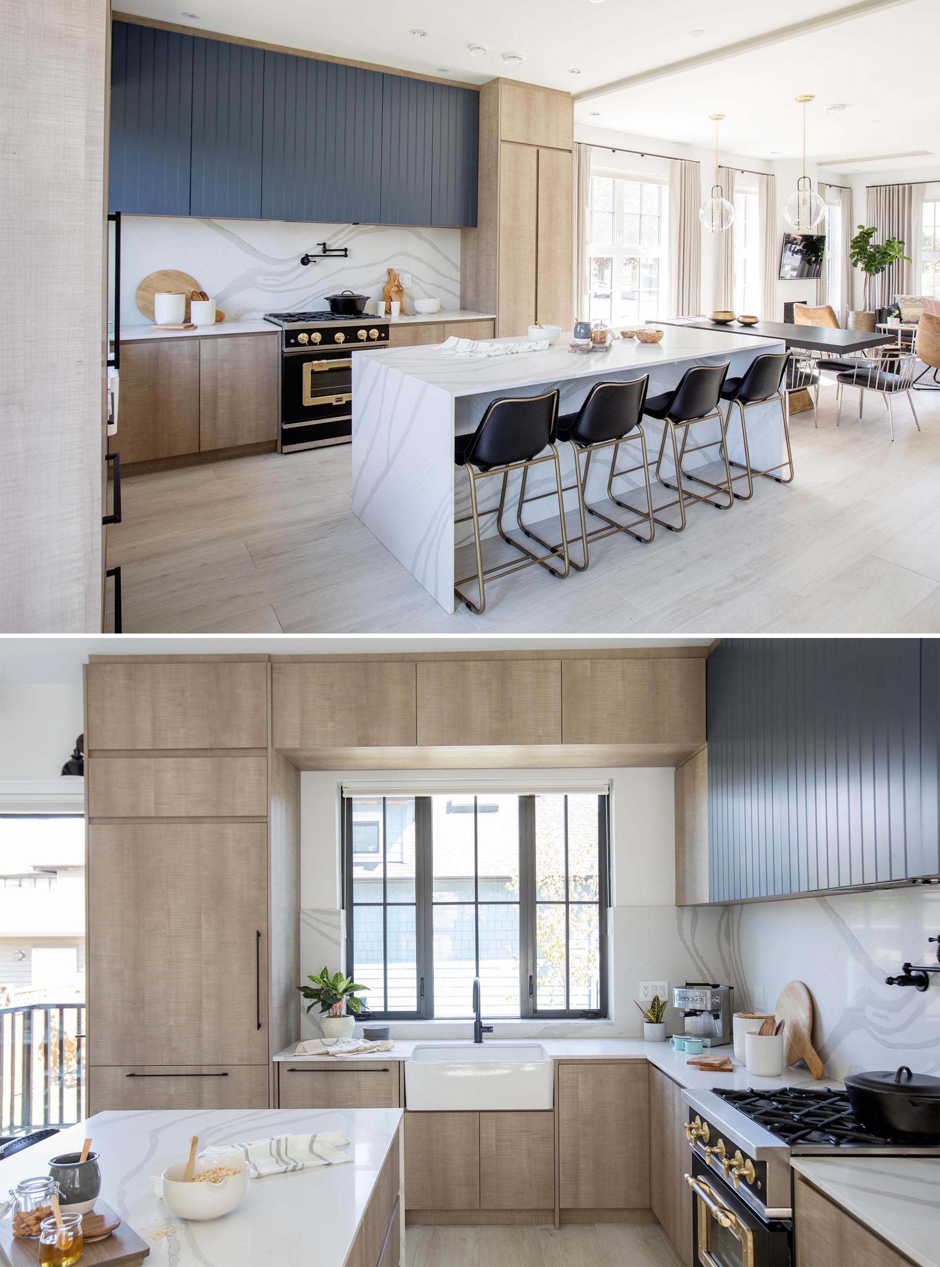 A modern kitchen with minimalist wood cabinets, an integrated fridge,  light countertops, and black accent cabinets.