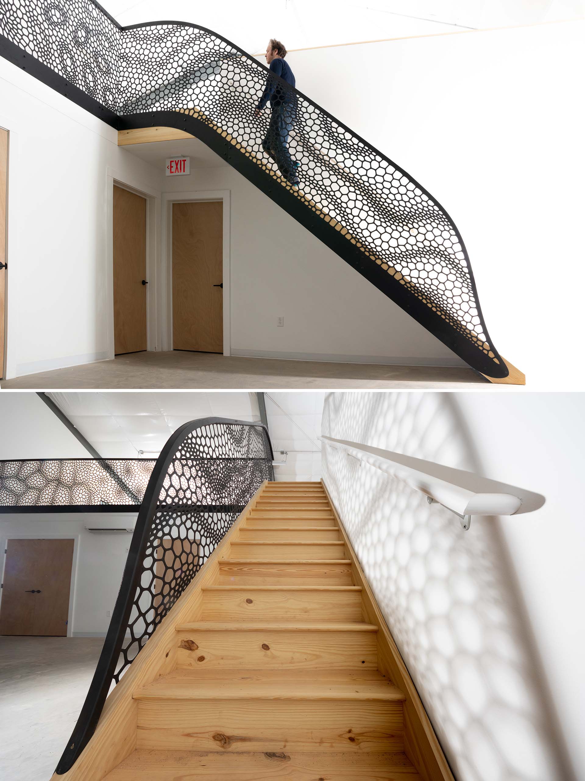 An artistic laser cut staircase railing with a matte black finish.
