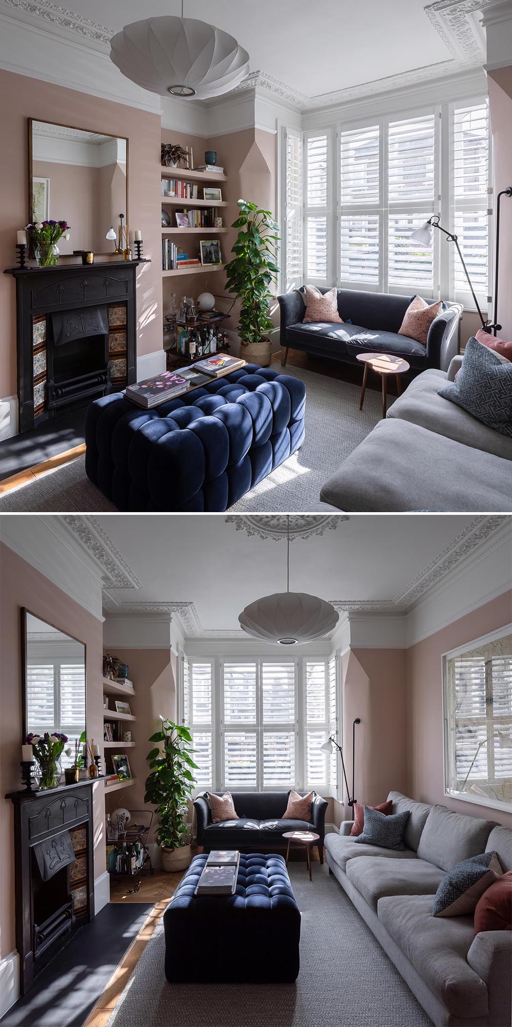 A living room with blush pink walls, contemporary furniture, built-in shelving, and a fireplace.