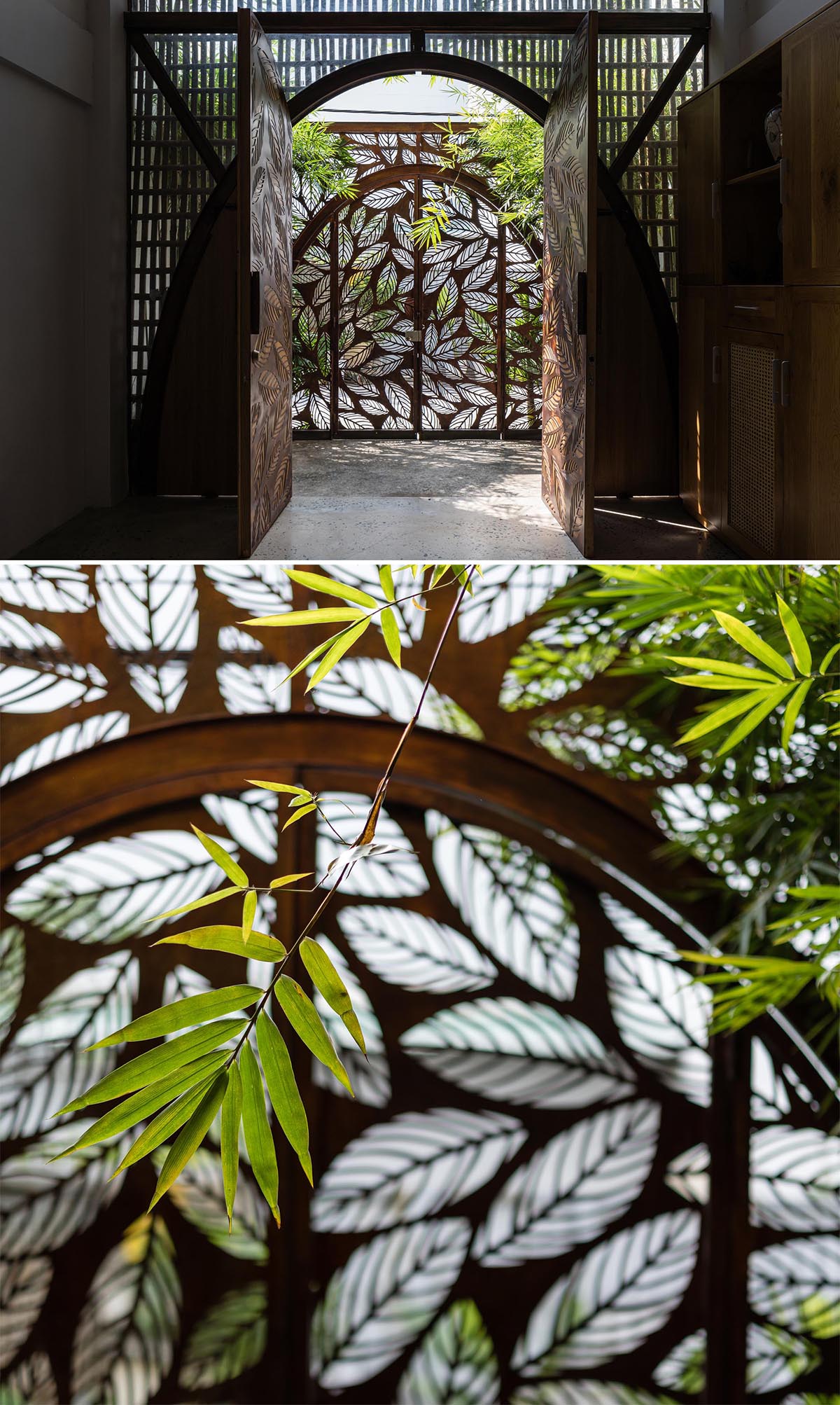 Arched metal doors with a leaf motif greets visitors to this modern house.