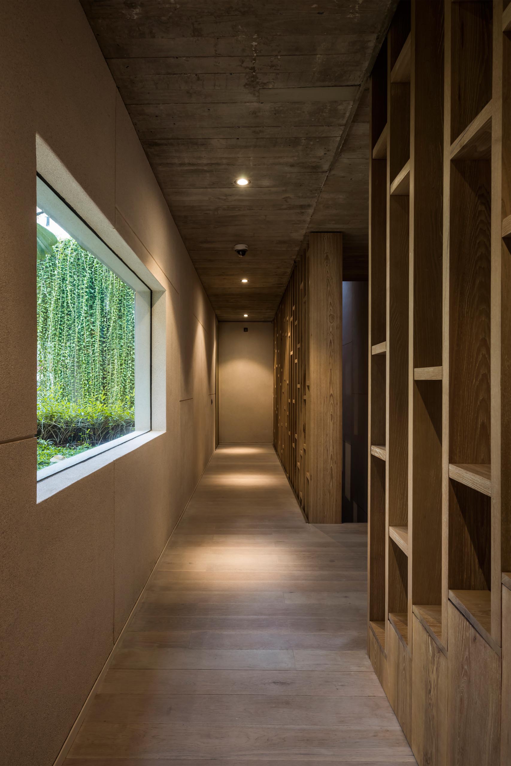 A modern house with wood shelves.