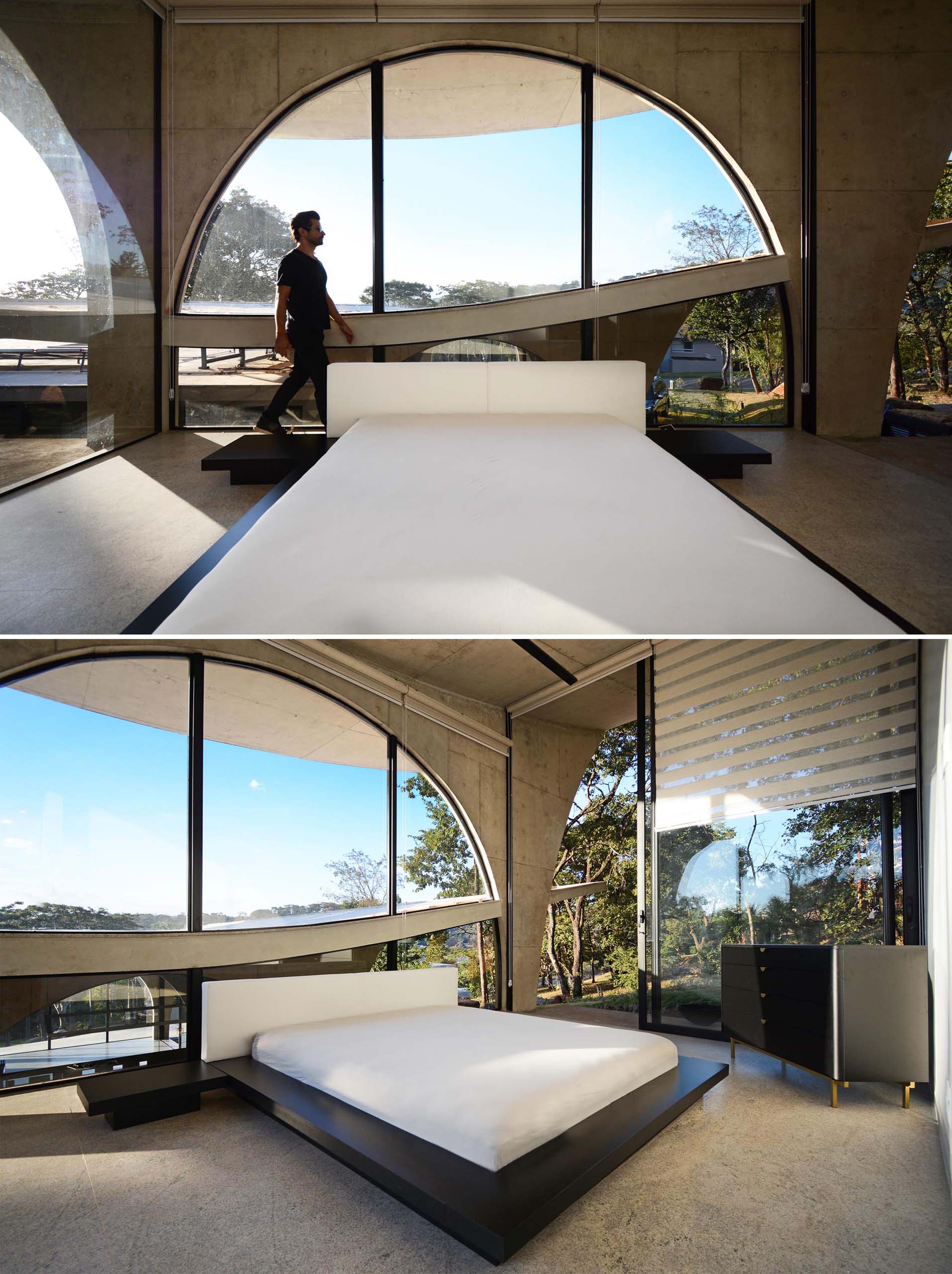 In this modern bedroom, the arches provide an abundance of natural light and add a sculptural element to the room.