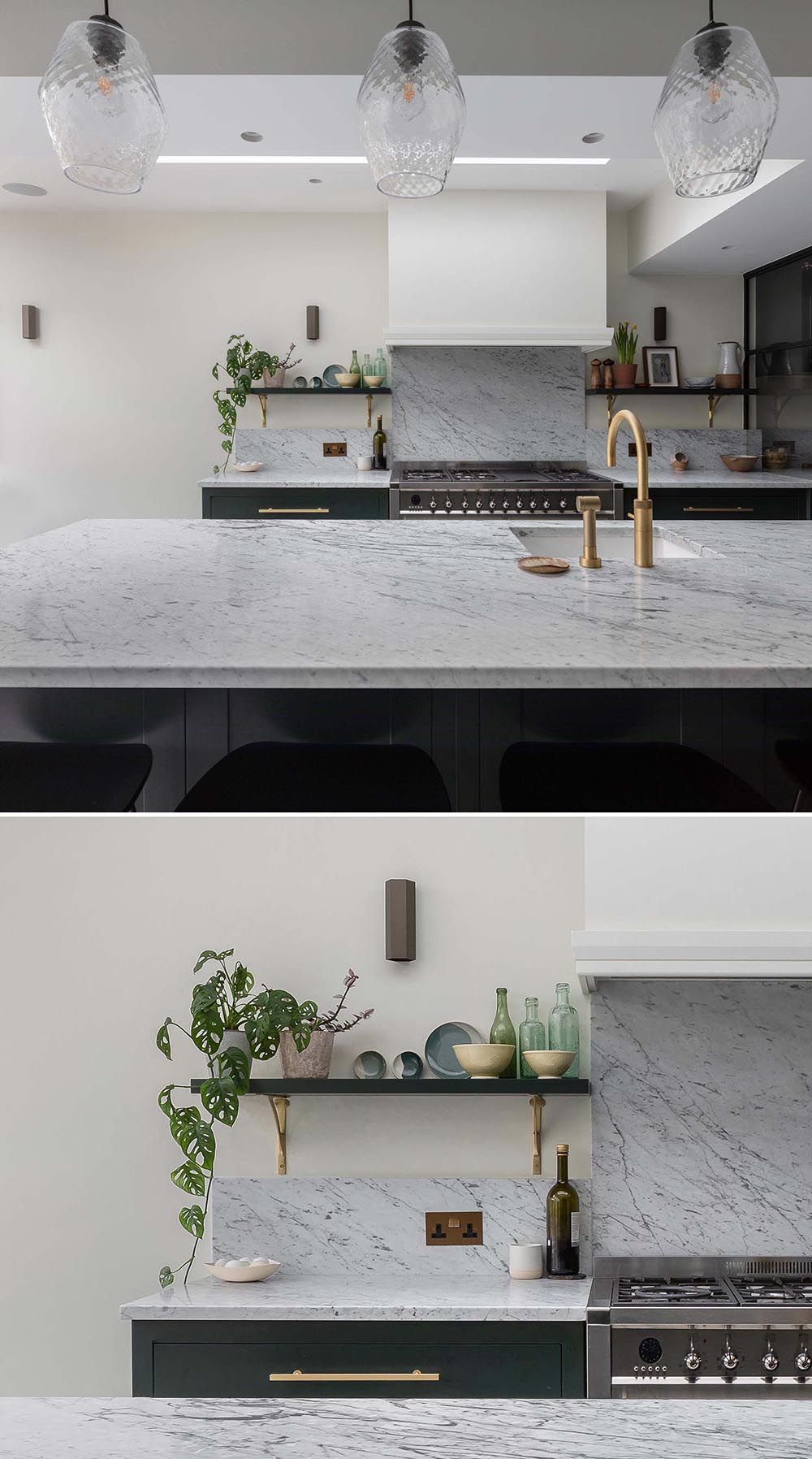 A modern kitchen with dark cabinets that have been paired with gray marble countertops and brass fixtures.