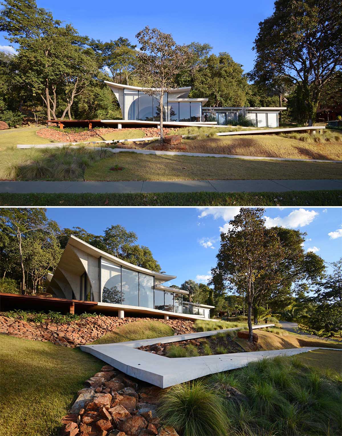 A modern concrete, glass, and wood home filled with arches.